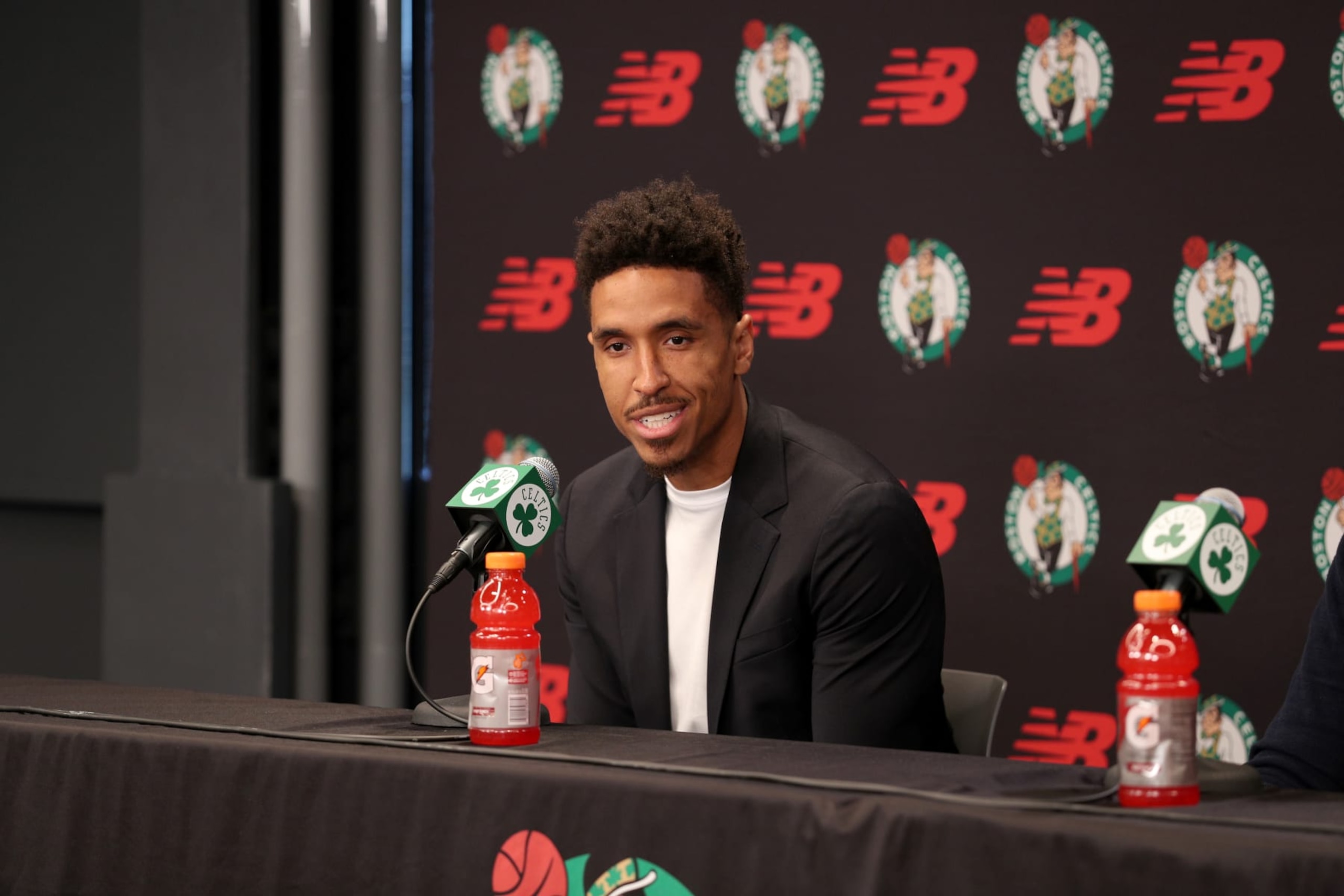BOSTON, MA - JULY 12: The Boston Celtics introduce new players Malcolm Brogdon and Danilo Gallinari during a press conference on July 12, 2022 at the Auerbach Center in Boston, Massachusetts. NOTE TO USER: User expressly acknowledges and agrees that, by downloading and or using this photograph, User is consenting to the terms and conditions of the Getty Images License Agreement. Mandatory Copyright Notice: Copyright 2022 NBAE (Photo by Chris Marion/NBAE via Getty Images) BOSTON, MA - JULY 12: The Boston Celtics introduce new players Malcolm Brogdon and Danilo Gallinari during a press conference on July 12, 2022 at the Auerbach Center in Boston, Massachusetts. NOTE TO USER: User expressly acknowledges and agrees that, by downloading and or using this photograph, User is consenting to the terms and conditions of the Getty Images License Agreement. Mandatory Copyright Notice: Copyright 2022 NBAE (Photo by Chris Marion/NBAE via Getty Images)