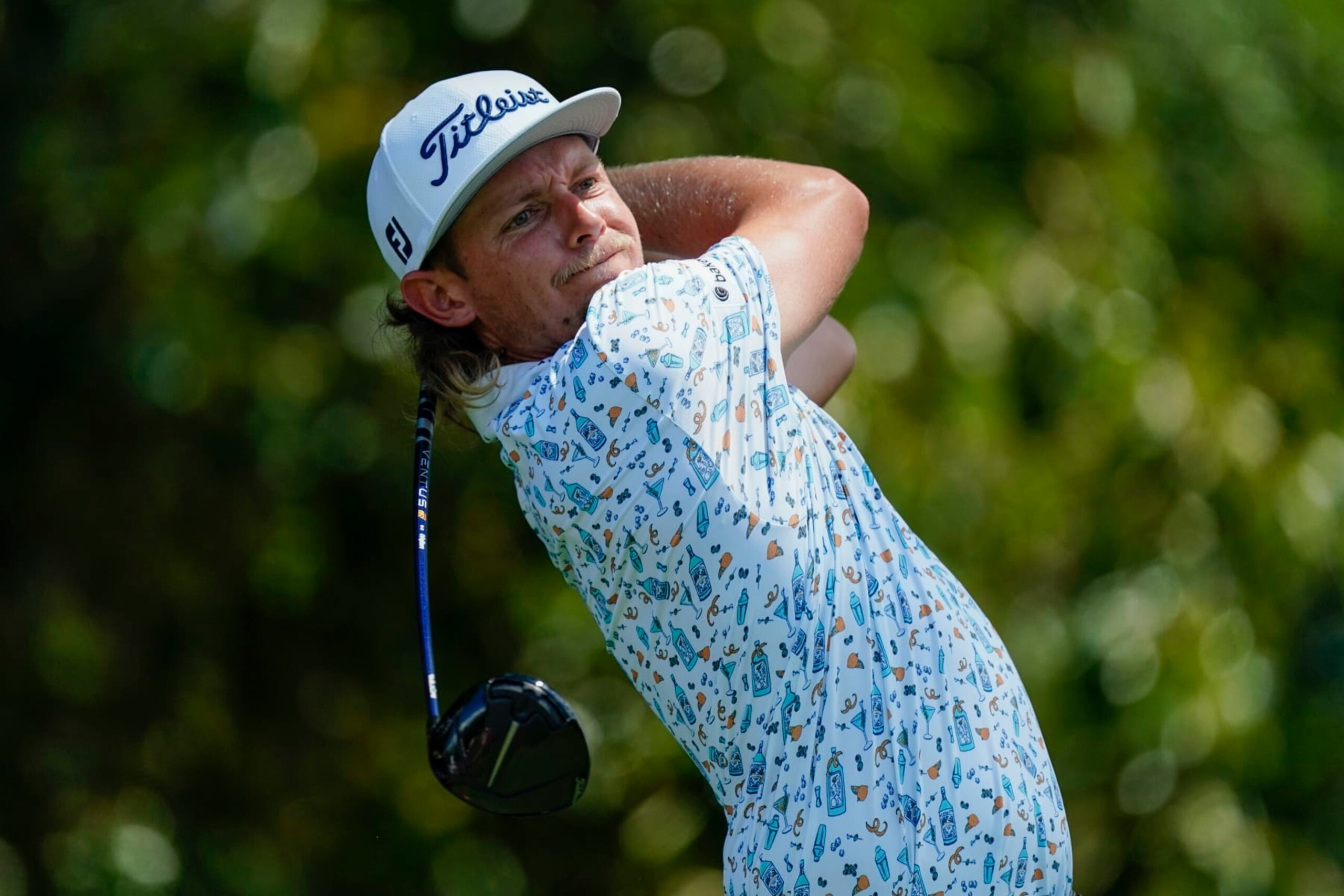 Cameron Smith, of Australia, hits from the third tee during the second round of the Tour Championship golf tournament at East Lake Golf Club, Friday, Aug. 26, 2022, in Atlanta. (AP Photo/John Bazemore)