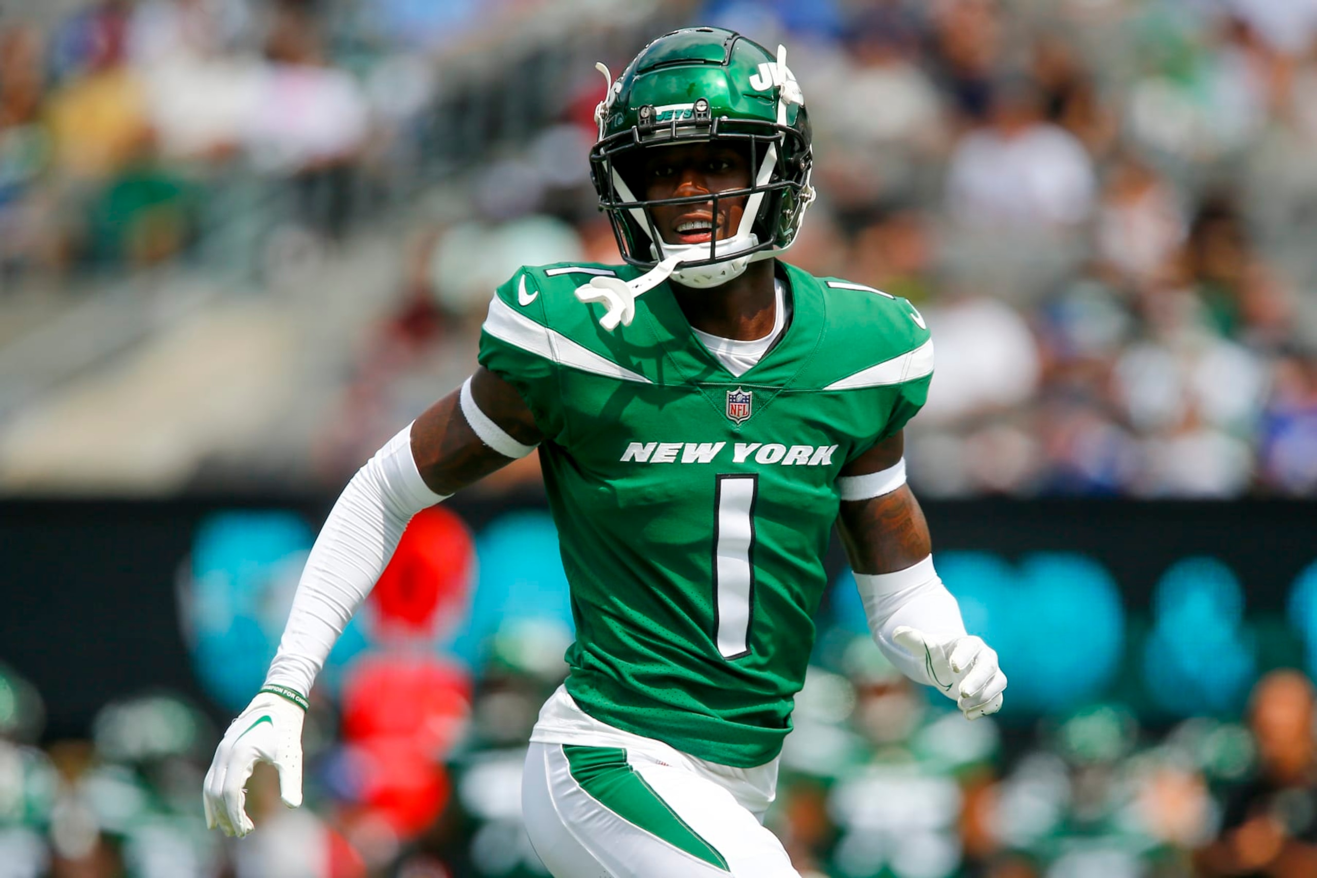 New York Jets cornerback Sauce Gardner (1) runs on a play in the first half of a preseason NFL football game against the New York Giants, Sunday, Aug. 28, 2022, in East Rutherford, N.J. (AP Photo/John Munson)