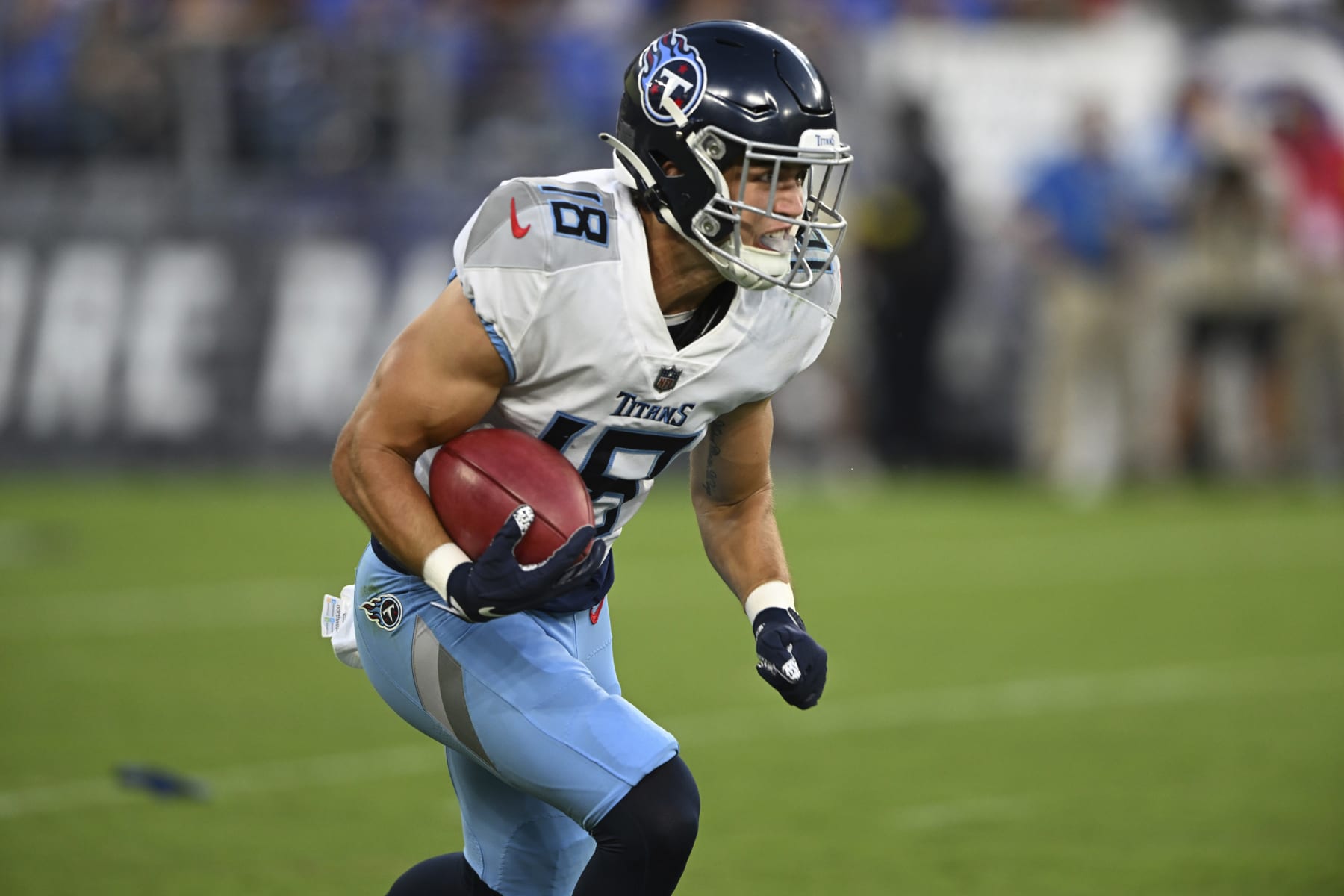 Tennessee Titan wide receiver Kyle Phillips runs the ball during the first half of an NFL football game, Thursday, Aug. 11, 2022, in Baltimore. (AP Photo/Gail Burton)