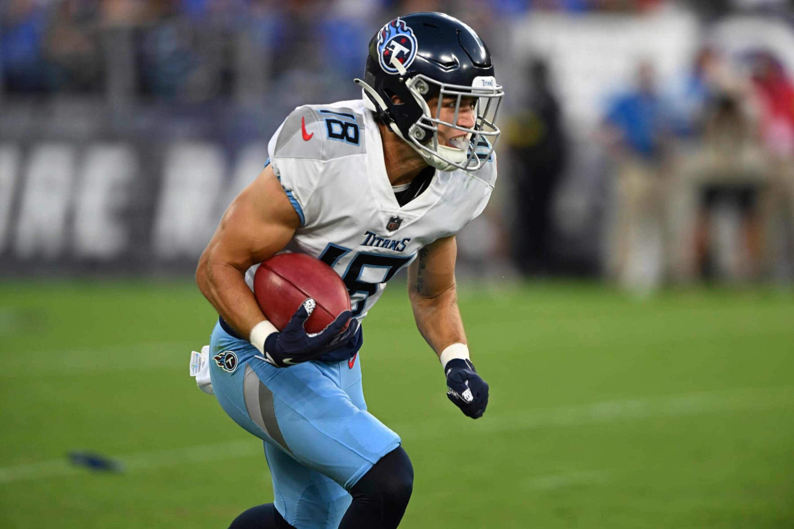 Tennessee Titan wide receiver Kyle Phillips runs the ball during the first half of an NFL football game, Thursday, Aug. 11, 2022, in Baltimore. (AP Photo/Gail Burton)