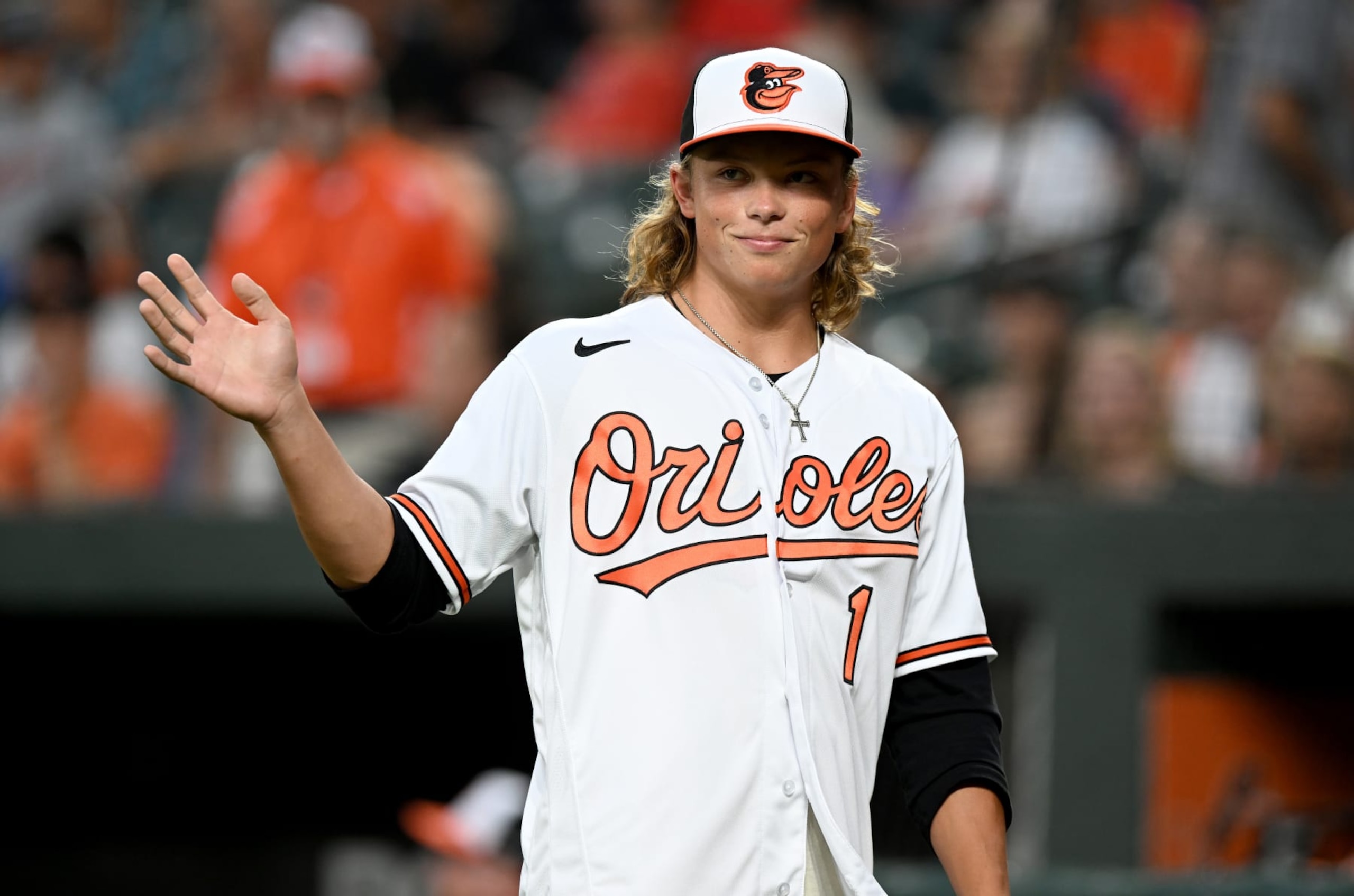 BALTIMORE, MARYLAND - JULY 27: 2022 Baltimore Orioles first round pick, and Number 1 overall selection of the 2022 First-Year Player Draft, Jackson Holliday is introduced to the crowd before the fourth inning of the game between the Baltimore Orioles and the Tampa Bay Rays at Oriole Park at Camden Yards on July 27, 2022 in Baltimore, Maryland. (Photo by G Fiume/Getty Images)