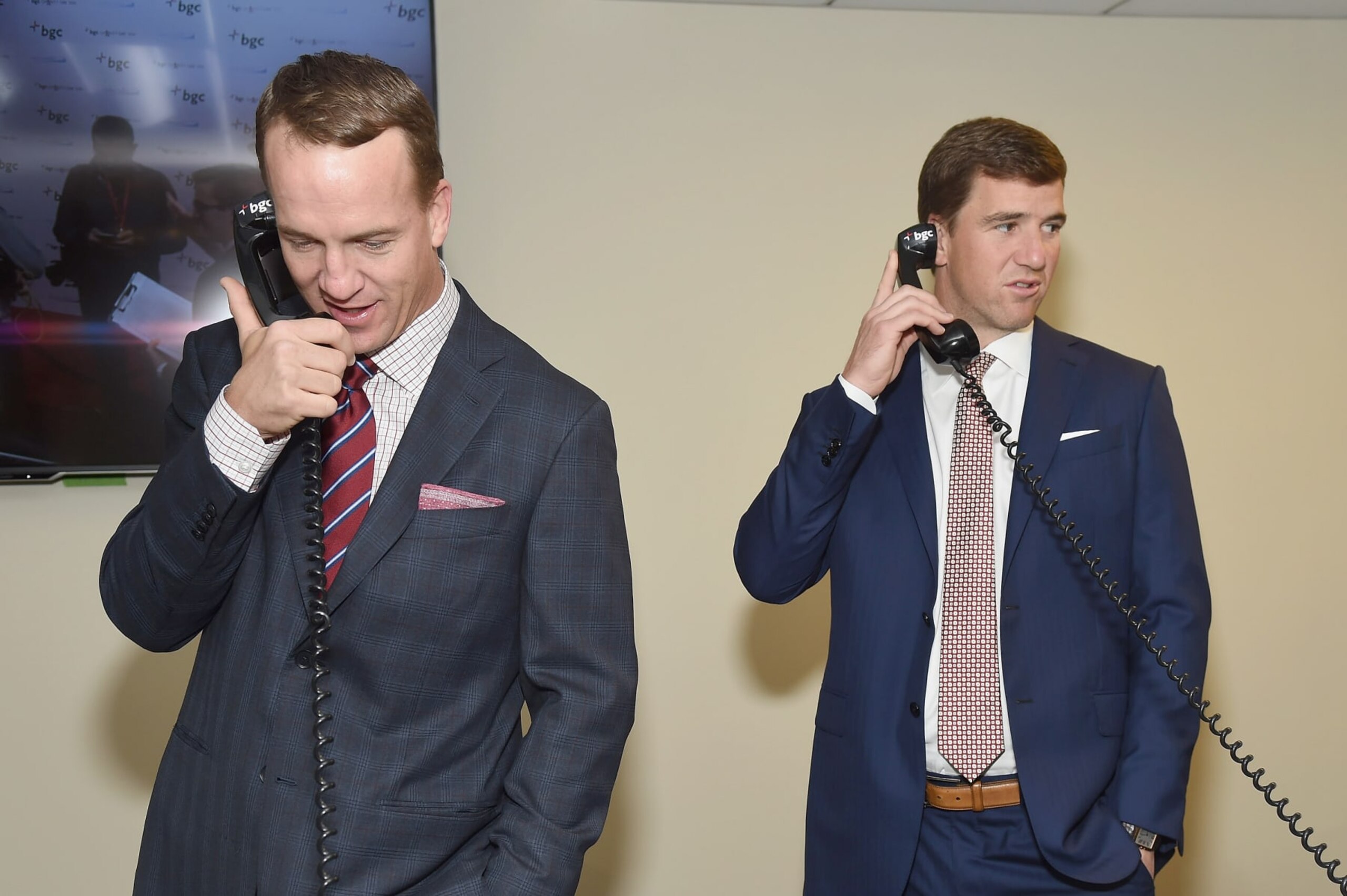 NEW YORK, NY - SEPTEMBER 12:  Peyton Manning (L) and Eli Manning attend Annual Charity Day hosted by Cantor Fitzgerald, BGC and GFI at BGC Partners, INC on September 12, 2016 in New York City.  (Photo by Gary Gershoff/Getty Images for Cantor Fitzgerald)