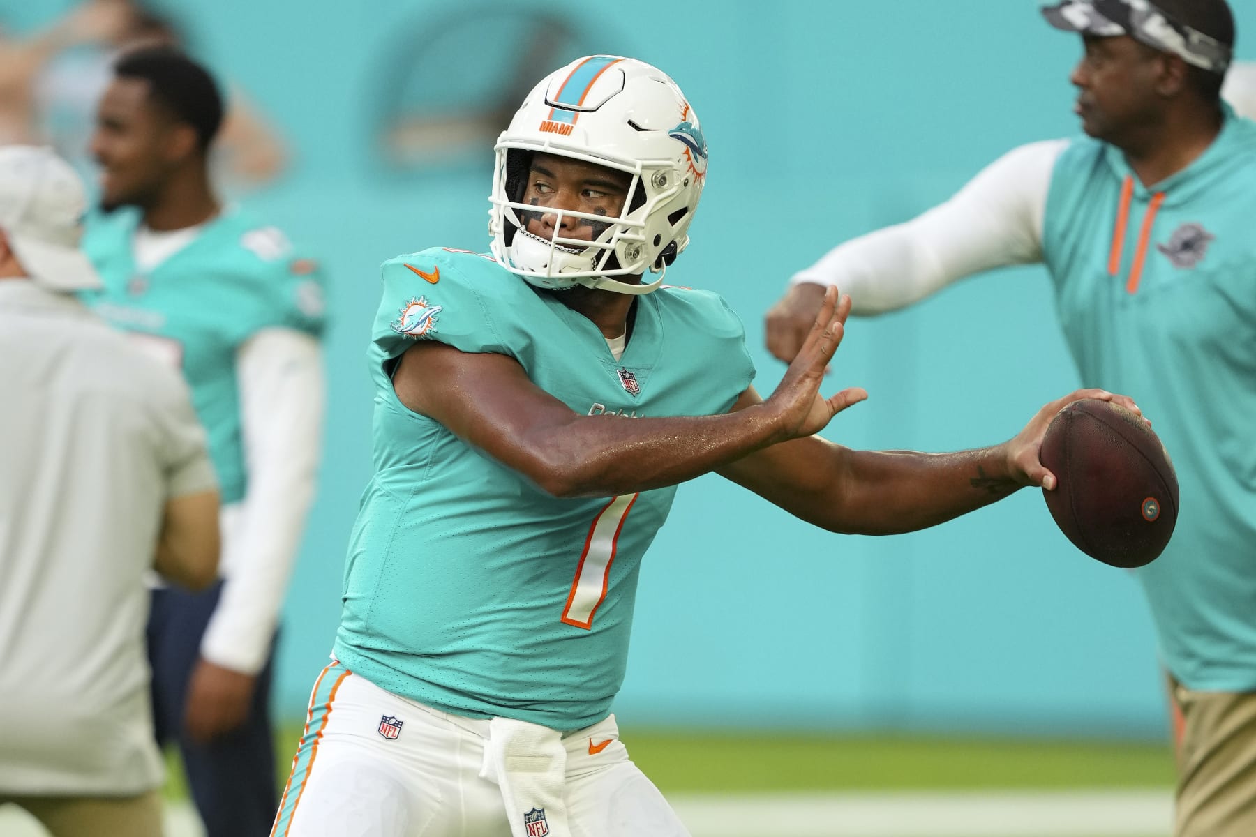 MIAMI GARDENS, FLORIDA - AUGUST 27: Tua Tagovailoa #1 of the Miami Dolphins warms up before the preseason game against the Philadelphia Eagles at Hard Rock Stadium on August 27, 2022 in Miami Gardens, Florida. (Photo by Eric Espada/Getty Images)