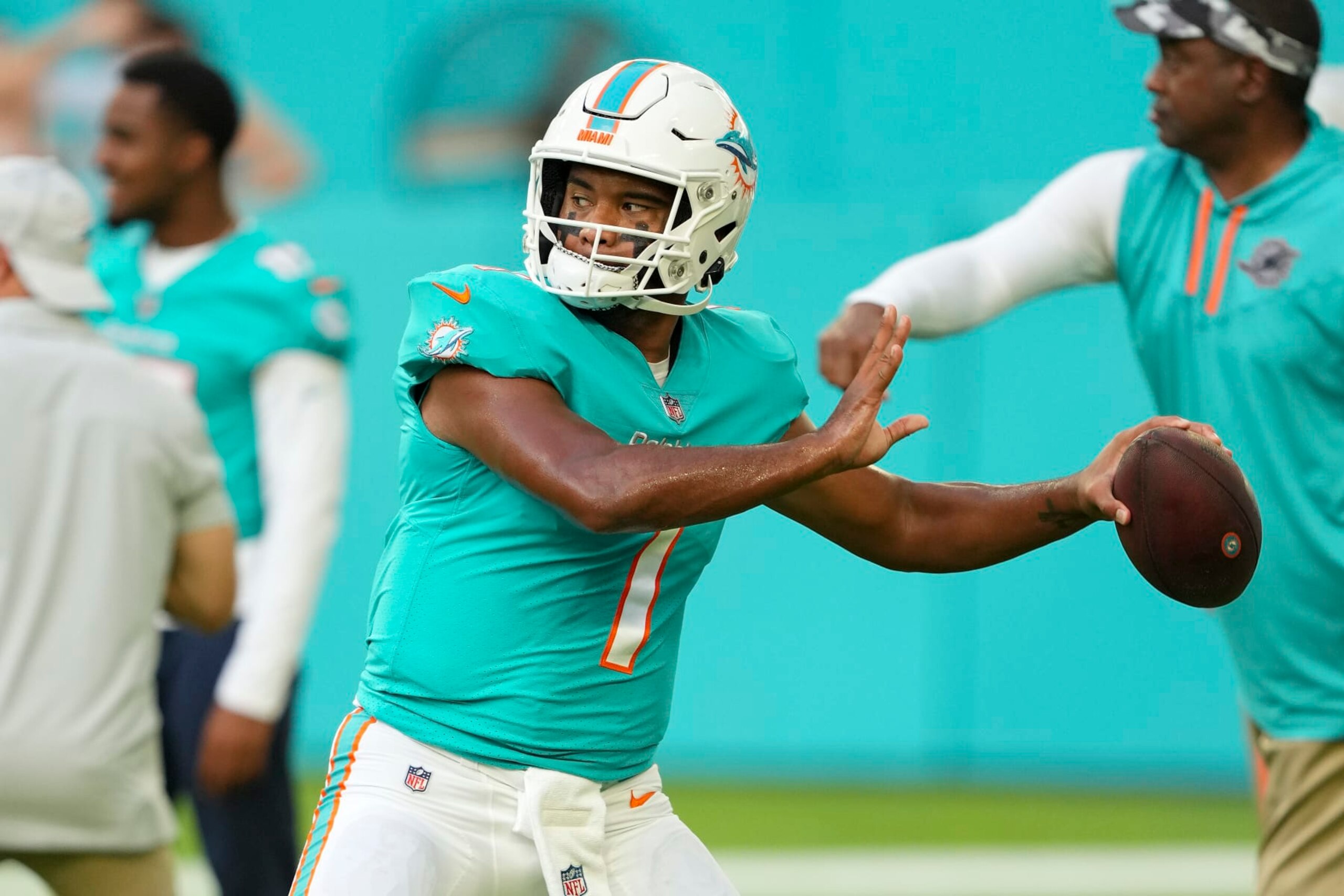 MIAMI GARDENS, FLORIDA - AUGUST 27: Tua Tagovailoa #1 of the Miami Dolphins warms up before the preseason game against the Philadelphia Eagles at Hard Rock Stadium on August 27, 2022 in Miami Gardens, Florida. (Photo by Eric Espada/Getty Images)