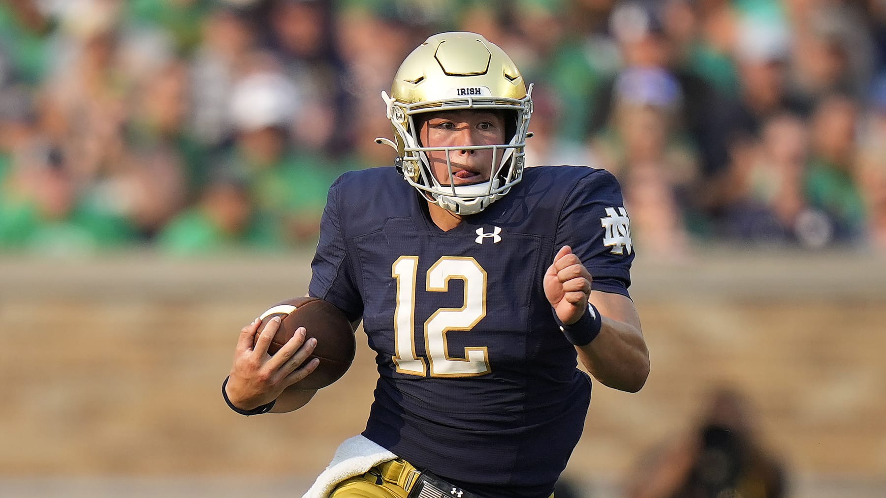 Notre Dame quarterback Tyler Buchner (12) in action against Toledo in an NCAA college football game in South Bend, Ind., Saturday, Sept. 11, 2021. Notre Dame won 32-29. (AP Photo/AJ Mast)