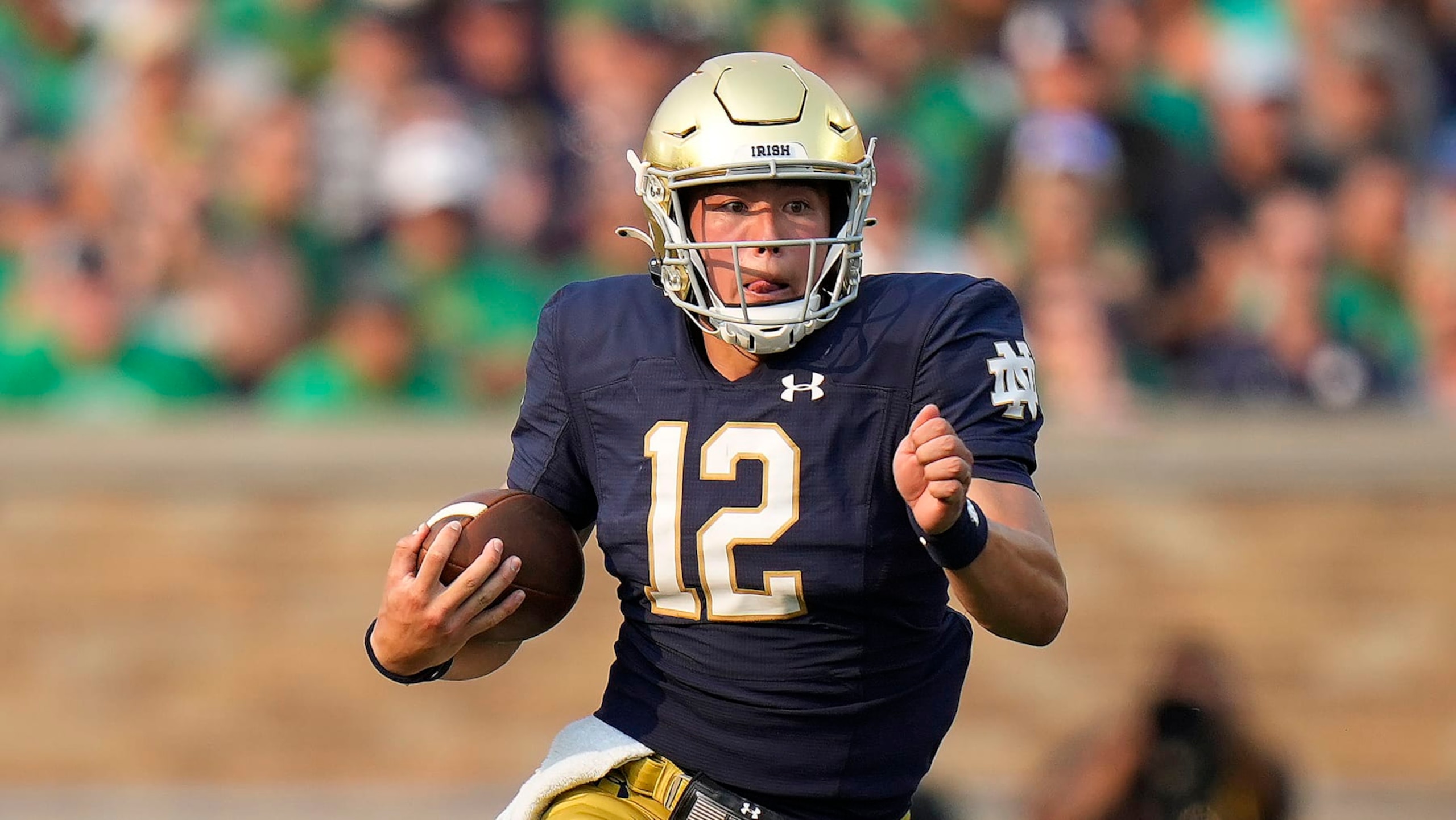 Notre Dame quarterback Tyler Buchner (12) in action against Toledo in an NCAA college football game in South Bend, Ind., Saturday, Sept. 11, 2021. Notre Dame won 32-29. (AP Photo/AJ Mast)