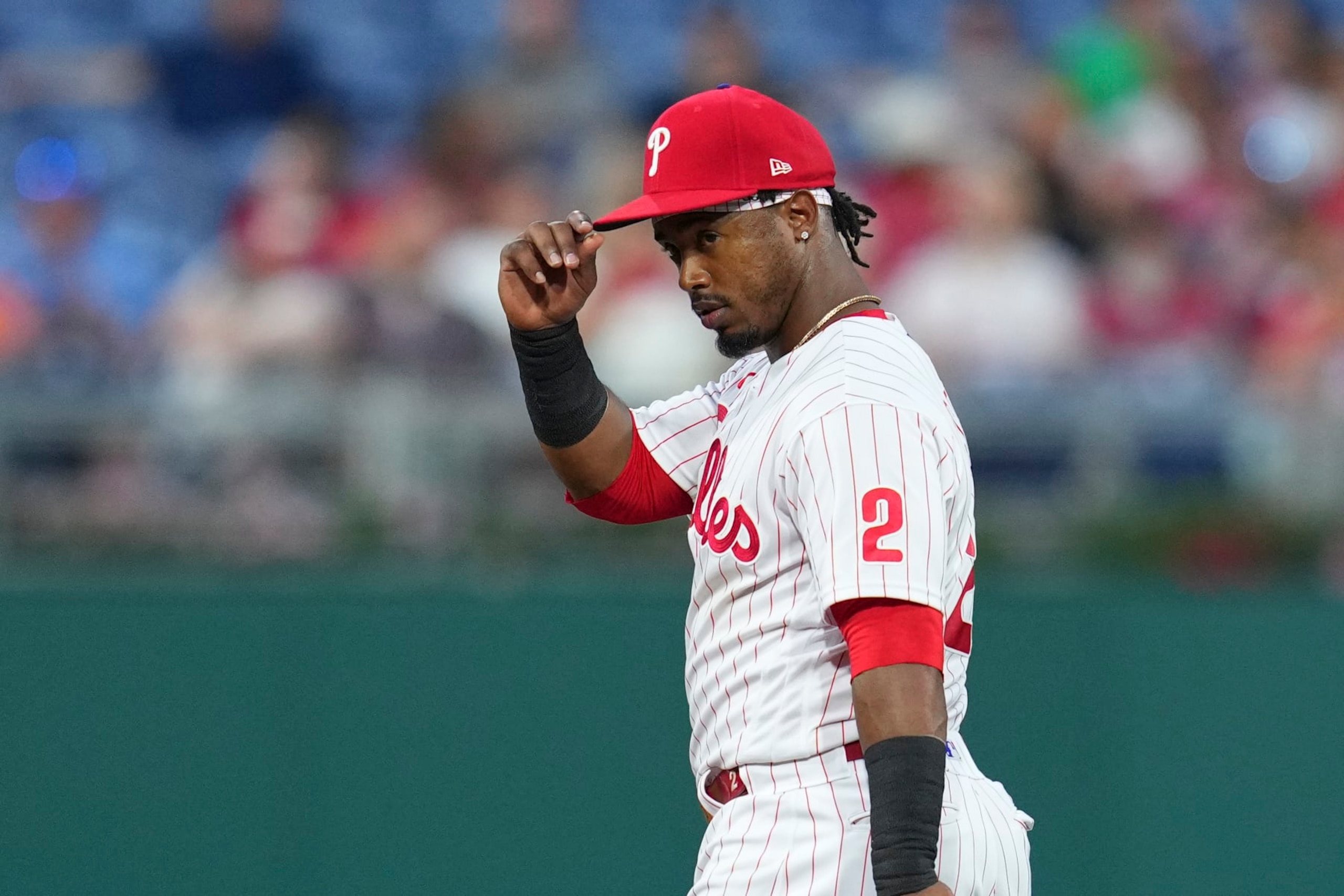 PHILADELPHIA, PA - AUGUST 23: Jean Segura #2 of the Philadelphia Phillies tips his hat against the Cincinnati Reds at Citizens Bank Park on August 23, 2022 in Philadelphia, Pennsylvania. The Philadelphia Phillies defeated the Cincinnati Reds 7-6. (Photo by Mitchell Leff/Getty Images)
