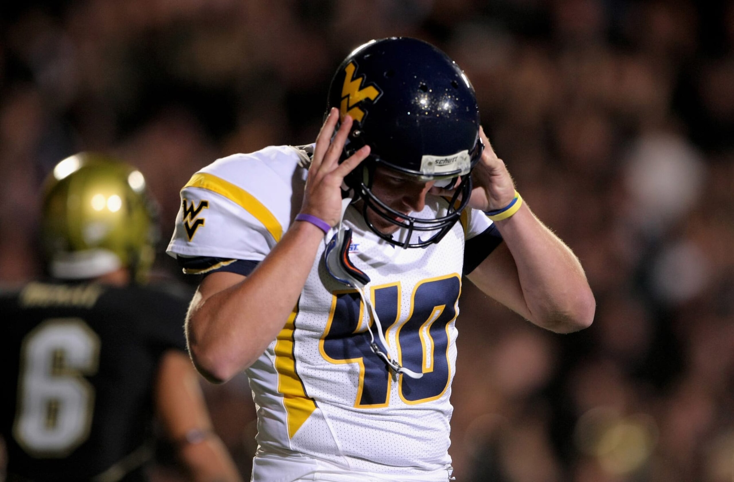 BOULDER, CO - SEPTEMBER 18:  Place kicker Pat McAfee #40 of the West Virginia Mountaineers reacts after missing a field goal in overtime against the Colorado Buffaloes at Folsom Field September 18, 2008 in Boulder, Colorado. Colorado defeated West Virginia 17-14 in overtime.  (Photo by Doug Pensinger/Getty Images)