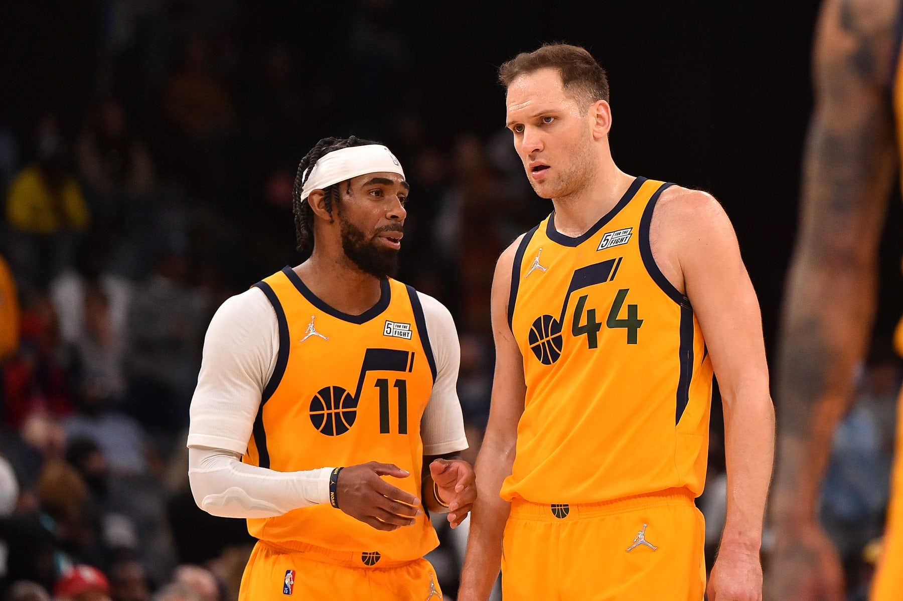 MEMPHIS, TENNESSEE - JANUARY 28: Mike Conley #11 of the Utah Jazz and Bojan Bogdanovic #44 of the Utah Jazz talk during the game against the Memphis Grizzlies at FedExForum on January 28, 2022 in Memphis, Tennessee. NOTE TO USER: User expressly acknowledges and agrees that, by downloading and or using this photograph, User is consenting to the terms and conditions of the Getty Images License Agreement.  (Photo by Justin Ford/Getty Images)