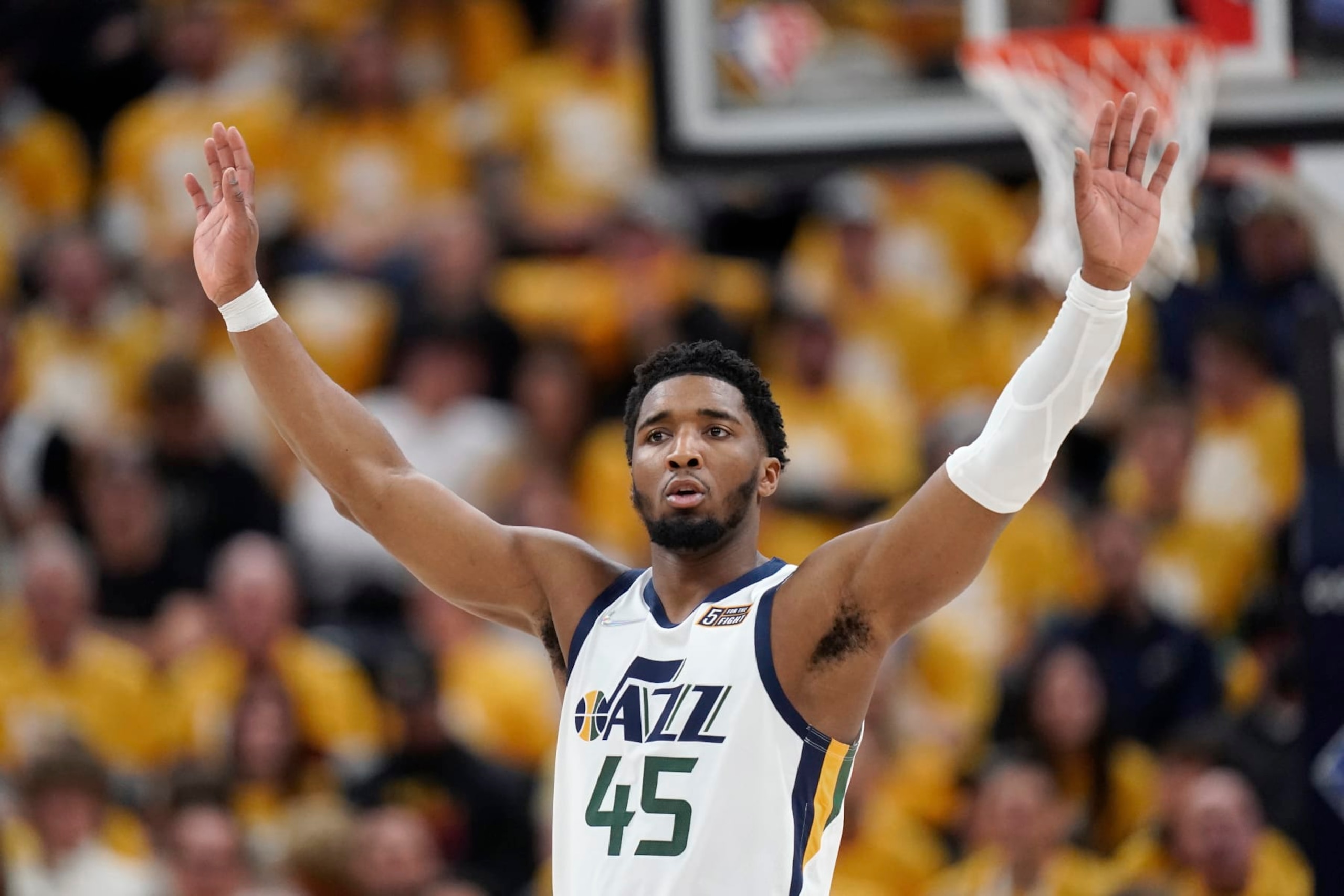 Utah Jazz guard Donovan Mitchell (45) reacts to the fans in the second half of Game 4 of an NBA basketball first-round playoff series against the Dallas Mavericks Saturday, April 23, 2022, in Salt Lake City. (AP Photo/Rick Bowmer) Utah Jazz guard Donovan Mitchell (45) reacts to the fans in the second half of Game 4 of an NBA basketball first-round playoff series against the Dallas Mavericks Saturday, April 23, 2022, in Salt Lake City. (AP Photo/Rick Bowmer)