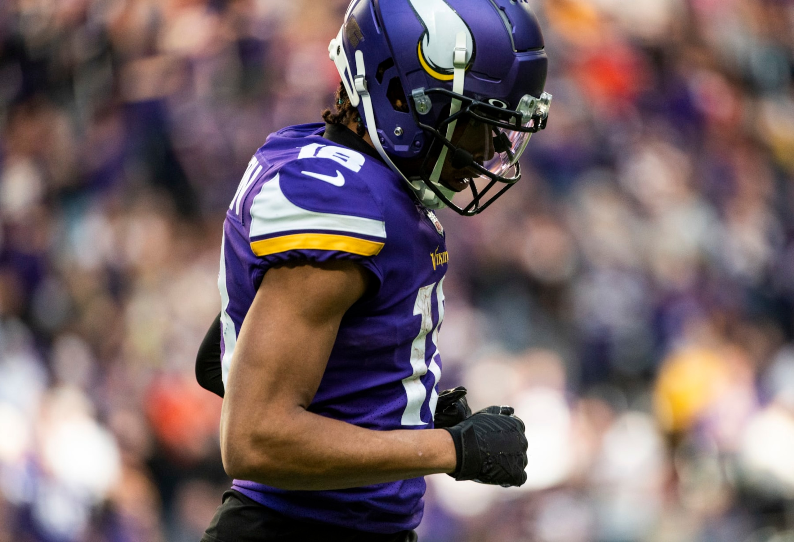 MINNEAPOLIS, MN - JANUARY 09: Justin Jefferson #18 of the Minnesota Vikings runs to the sidelines after scoring a touchdown in the fourth quarter of the game against the Chicago Bears at U.S. Bank Stadium on January 9, 2022 in Minneapolis, Minnesota. (Photo by Stephen Maturen/Getty Images) MINNEAPOLIS, MN - JANUARY 09: Justin Jefferson #18 of the Minnesota Vikings runs to the sidelines after scoring a touchdown in the fourth quarter of the game against the Chicago Bears at U.S. Bank Stadium on January 9, 2022 in Minneapolis, Minnesota. (Photo by Stephen Maturen/Getty Images)