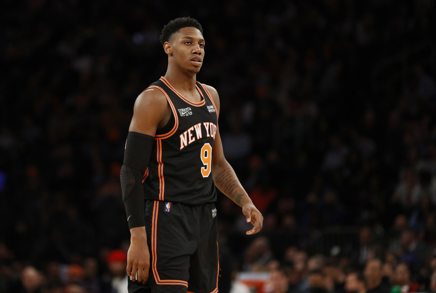 NEW YORK, NEW YORK - APRIL 06: RJ Barrett #9 of the New York Knicks looks on during the second half against the Brooklyn Nets at Madison Square Garden on April 06, 2022 in New York City. The Nets won 110-98. NOTE TO USER: User expressly acknowledges and agrees that, by downloading and or using this photograph, User is consenting to the terms and conditions of the Getty Images License Agreement.  (Photo by Sarah Stier/Getty Images)