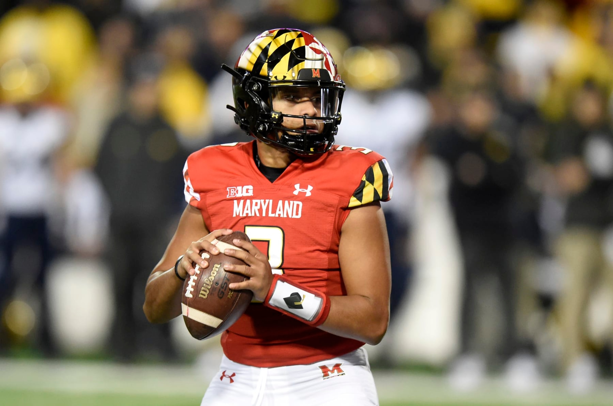 COLLEGE PARK, MARYLAND - NOVEMBER 20: Taulia Tagovailoa #3 of the Maryland Terrapins drops back to pass against the Michigan Wolverines at Capital One Field at Maryland Stadium on November 20, 2021 in College Park, Maryland. (Photo by G Fiume/Getty Images)