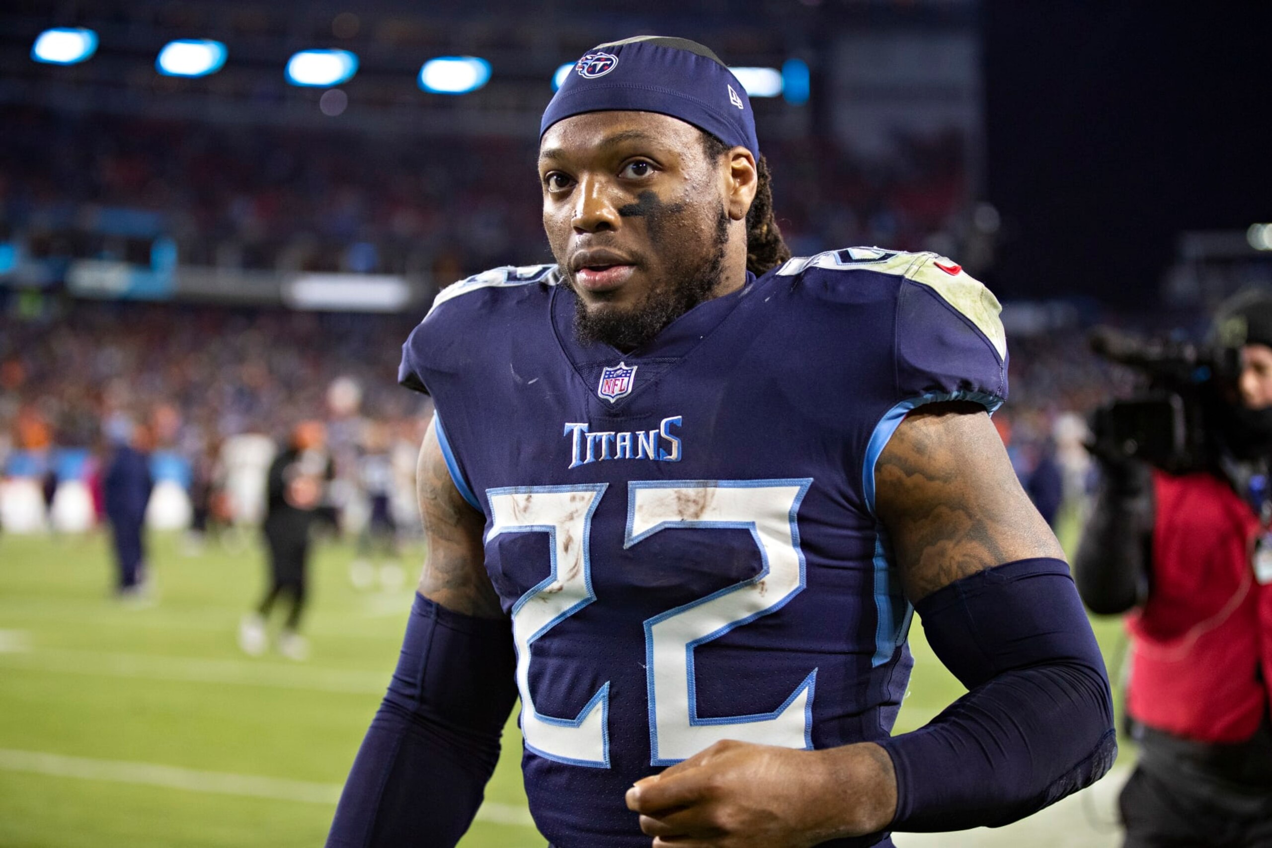 NASHVILLE, TENNESSEE - JANUARY 22: Derrick Henry #22 of the Tennessee Titans walks off the field after a game against the Cincinnati Bengals in the AFC Divisional Playoff game at Nissan Stadium on January 22, 2022 in Nashville, Tennessee. The Bengals defeated the Titans 19-16. (Photo by Wesley Hitt/Getty Images) NASHVILLE, TENNESSEE - JANUARY 22: Derrick Henry #22 of the Tennessee Titans walks off the field after a game against the Cincinnati Bengals in the AFC Divisional Playoff game at Nissan Stadium on January 22, 2022 in Nashville, Tennessee. The Bengals defeated the Titans 19-16. (Photo by Wesley Hitt/Getty Images)