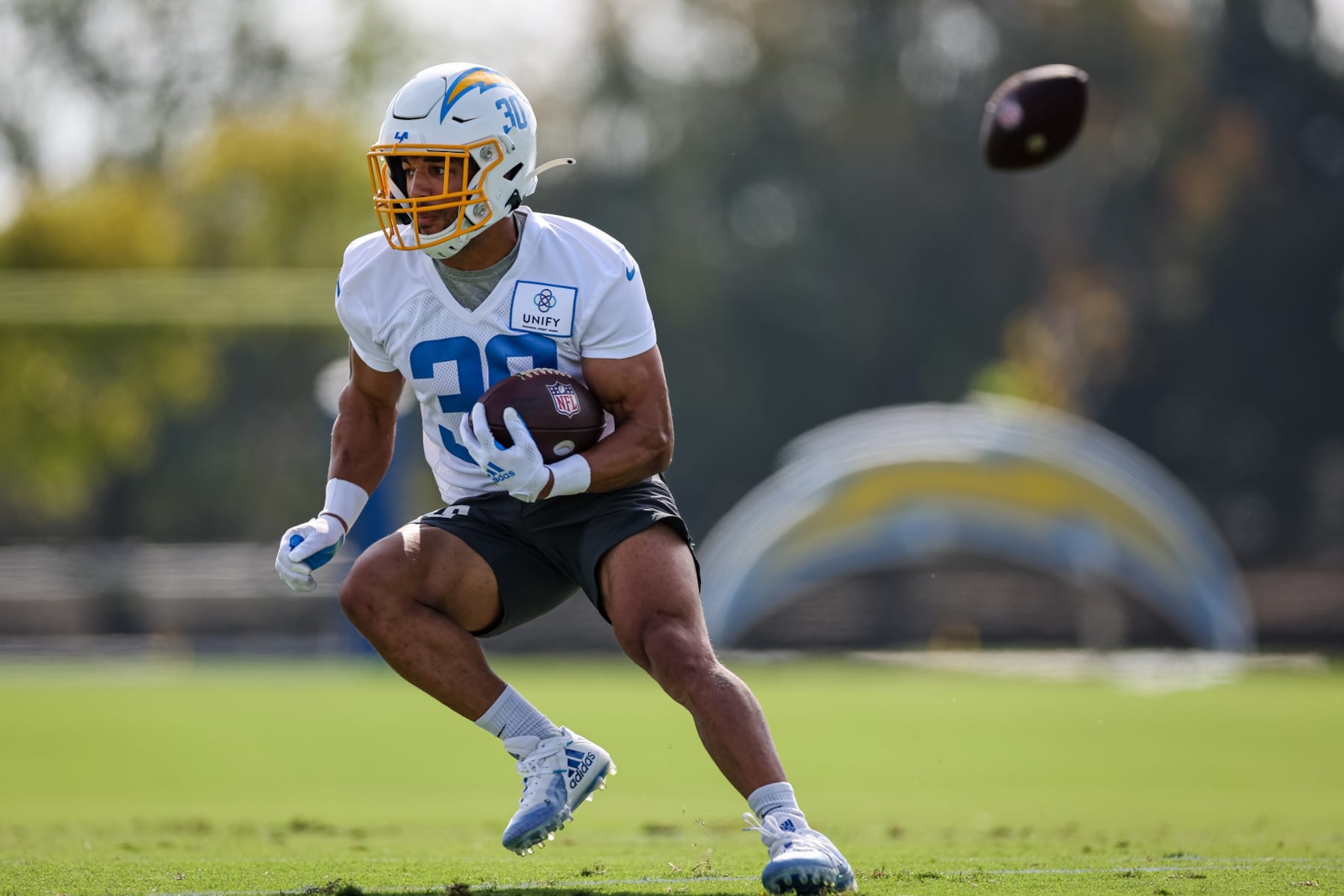 COSTA MESA, CA - JULY 27: Austin Ekeler #30 of the Los Angeles Chargers carries the ball during training camp at Jack Hammett Sports Complex on July 27, 2022 in Costa Mesa, California. (Photo by Scott Taetsch/Getty Images)