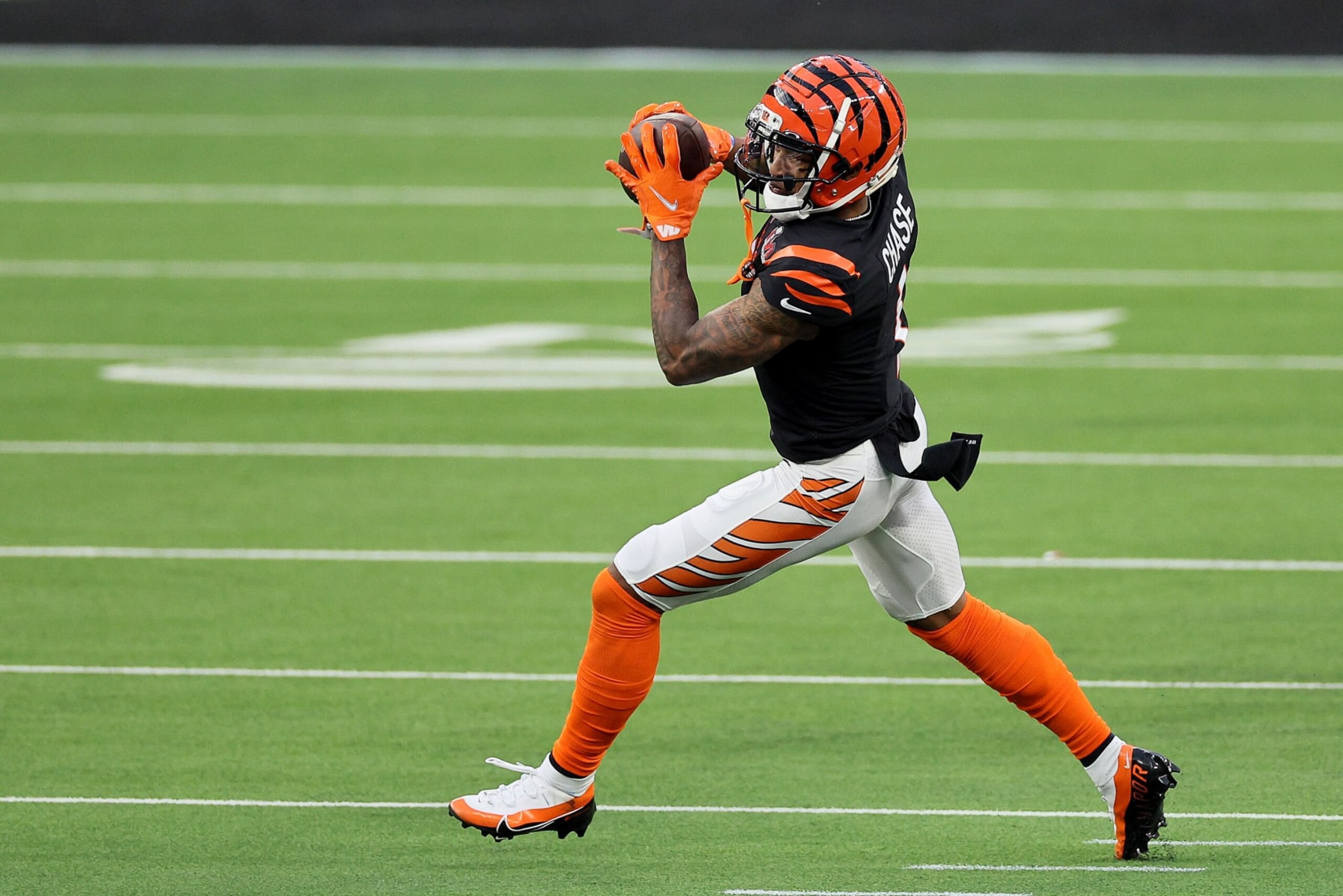 INGLEWOOD, CALIFORNIA - FEBRUARY 13: Ja'Marr Chase #1 of the Cincinnati Bengals catches the ball in the second quarter of the game against the Los Angeles Rams during Super Bowl LVI at SoFi Stadium on February 13, 2022 in Inglewood, California. (Photo by Andy Lyons/Getty Images)