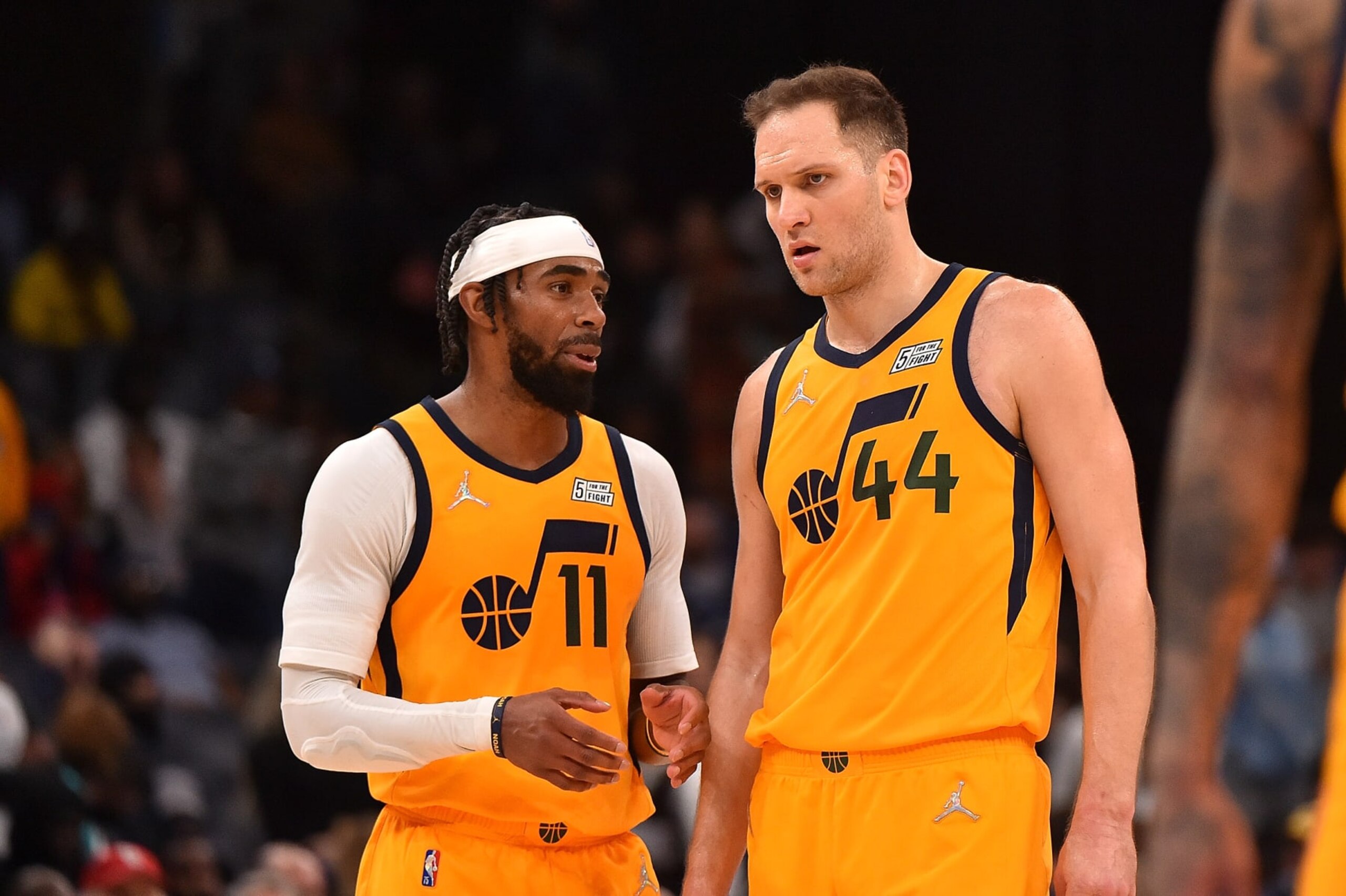 MEMPHIS, TENNESSEE - JANUARY 28: Mike Conley #11 of the Utah Jazz and Bojan Bogdanovic #44 of the Utah Jazz talk during the game against the Memphis Grizzlies at FedExForum on January 28, 2022 in Memphis, Tennessee. NOTE TO USER: User expressly acknowledges and agrees that, by downloading and or using this photograph, User is consenting to the terms and conditions of the Getty Images License Agreement.  (Photo by Justin Ford/Getty Images)