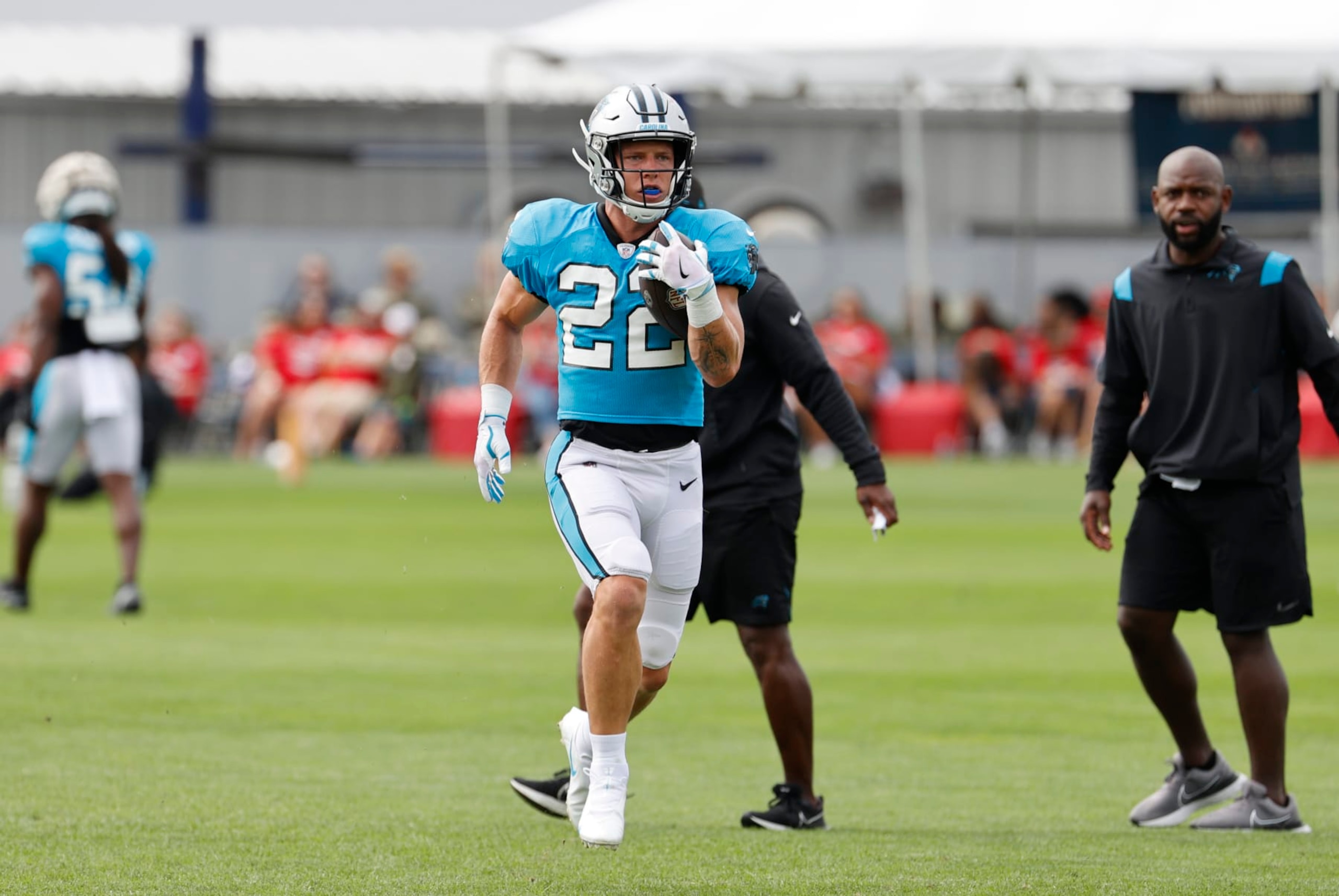 FOXBOROUGH, MA - AUGUST 17: Carolina Panthers running back Christian McCaffrey (22) carries the ball during a joint practice between the New England Patriots and the Carolina Panthers on August 17, 2022, at the Patriots Practice Facility at Gillette Stadium in Foxborough, Massachusetts. (Photo by Fred Kfoury III/Icon Sportswire via Getty Images)