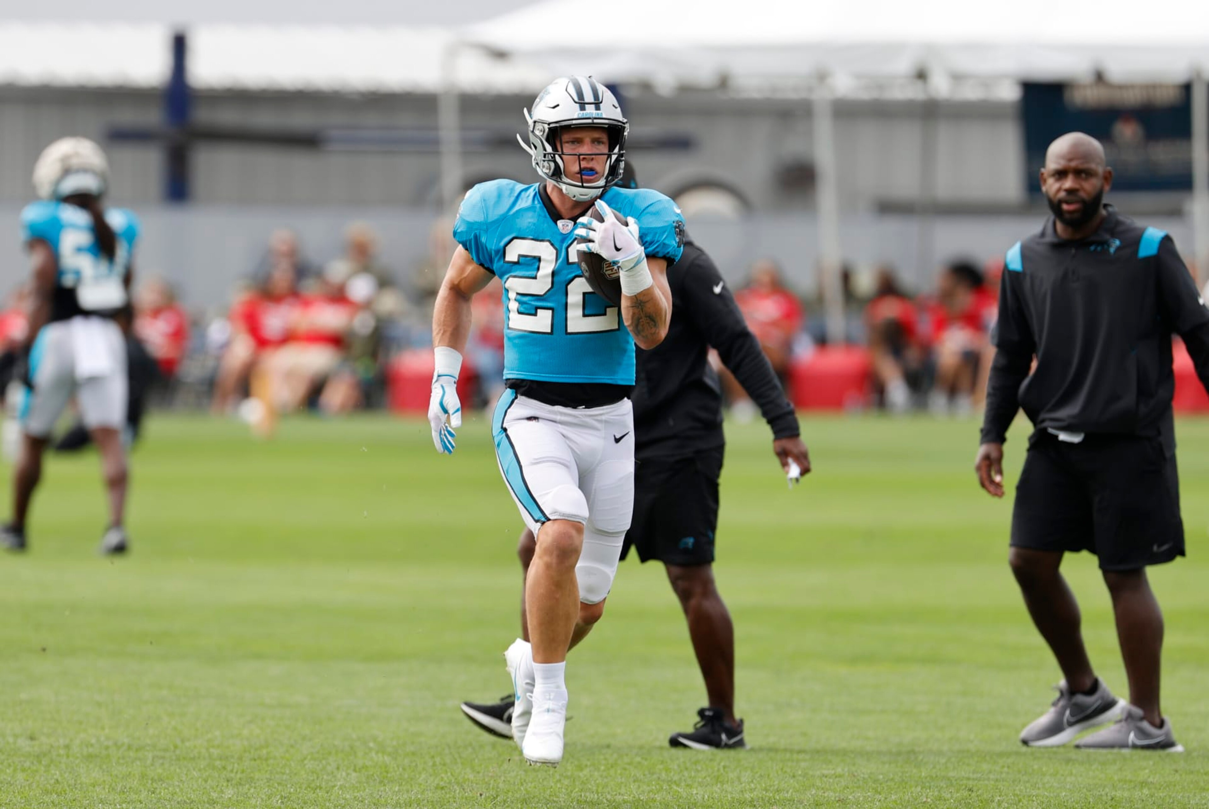 FOXBOROUGH, MA - AUGUST 17: Carolina Panthers running back Christian McCaffrey (22) carries the ball during a joint practice between the New England Patriots and the Carolina Panthers on August 17, 2022, at the Patriots Practice Facility at Gillette Stadium in Foxborough, Massachusetts. (Photo by Fred Kfoury III/Icon Sportswire via Getty Images)