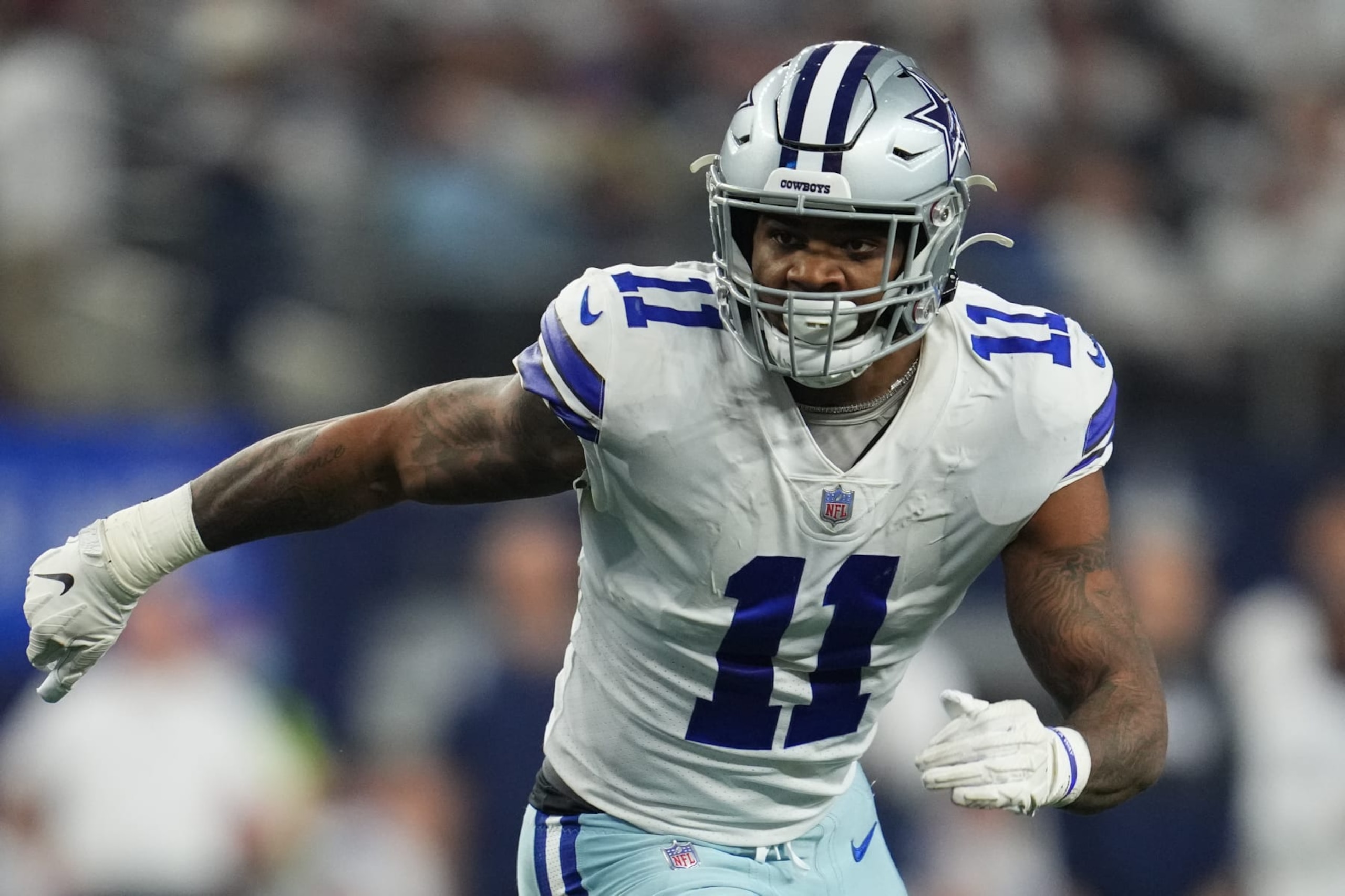 ARLINGTON, TEXAS - JANUARY 16: Micah Parsons #11 of the Dallas Cowboys defends against the San Francisco 49ers during an NFL wild-card playoff football game at AT&T Stadium on January 16, 2022 in Arlington, Texas.  (Photo by Cooper Neill/Getty Images)