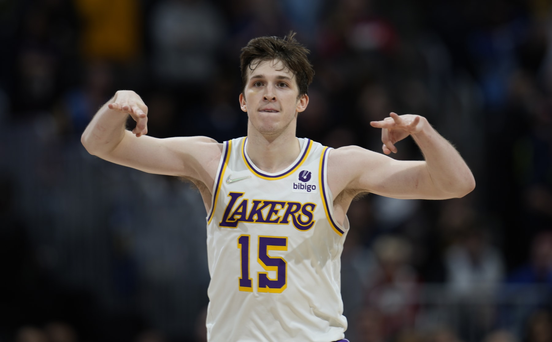 Los Angeles Lakers guard Austin Reaves reacts after hitting a key, 3-point basket late in overtime of a basketball game against the Denver Nuggets Sunday, April 10, 2022, in Denver. (AP Photo/David Zalubowski)