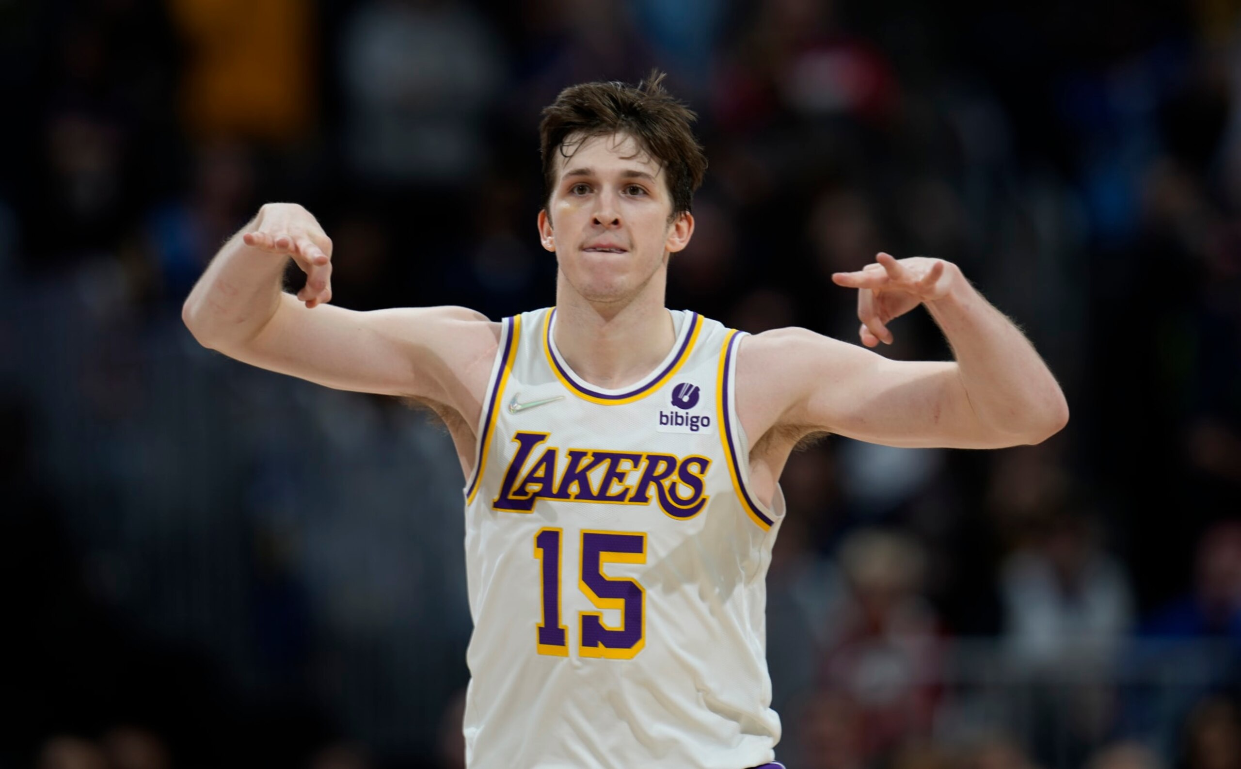 Los Angeles Lakers guard Austin Reaves reacts after hitting a key, 3-point basket late in overtime of a basketball game against the Denver Nuggets Sunday, April 10, 2022, in Denver. (AP Photo/David Zalubowski)