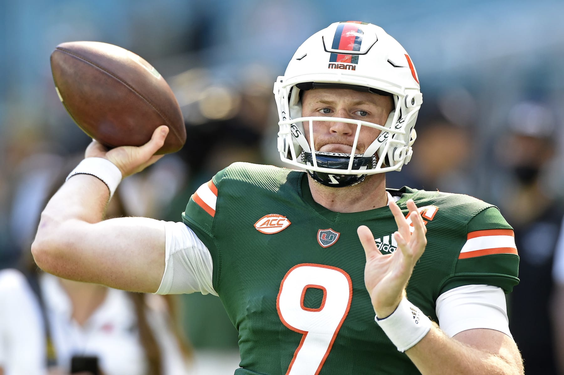 MIAMI GARDENS, FL - NOVEMBER 6:  Miami quarterback Tyler Van Dyke (9) runs through drills prior to the game as the University of Miami Hurricanes faced the Georgia Tech Yellow Jackets on November 6, 2021, at Hard Rock Stadium in Miami Gardens, Florida. (Photo by Samuel Lewis/Icon Sportswire via Getty Images)