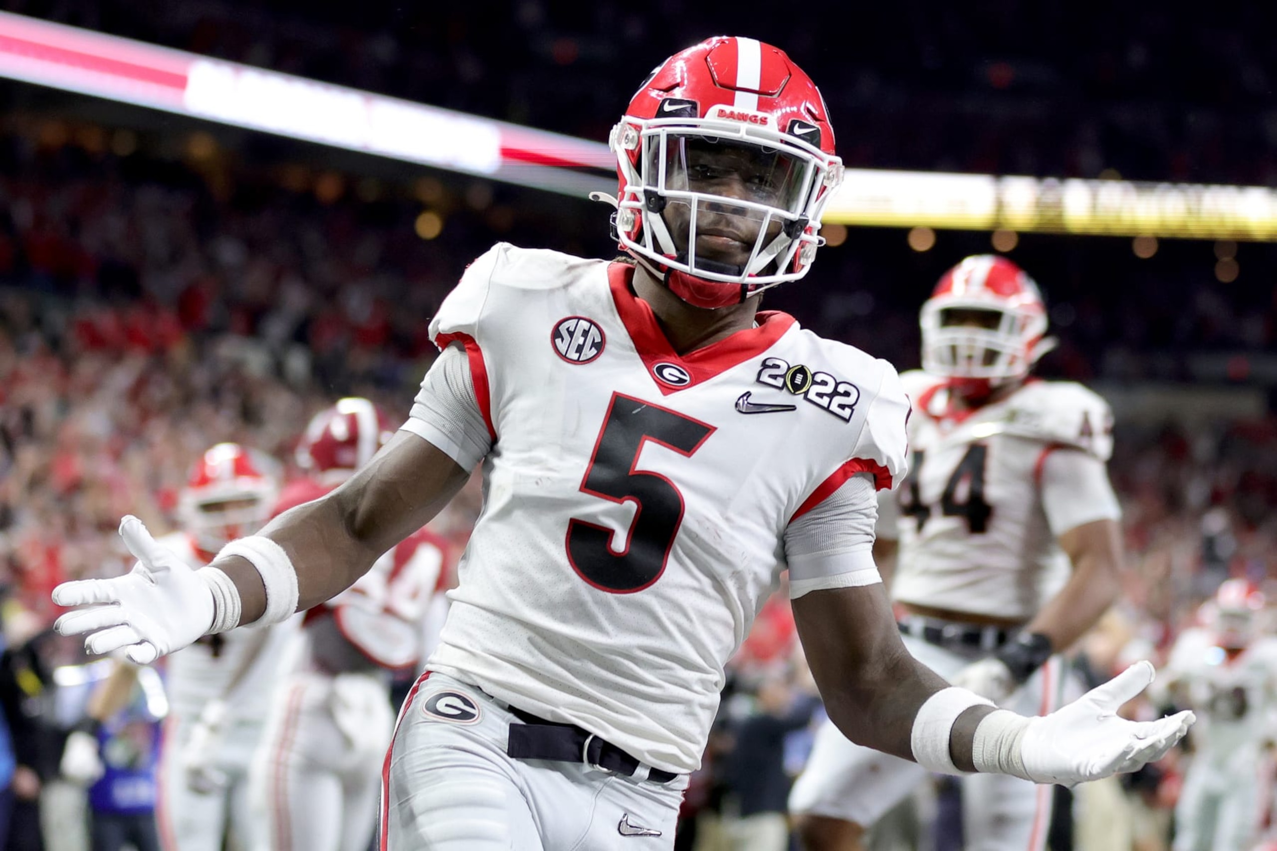 INDIANAPOLIS, INDIANA - JANUARY 10: Kelee Ringo #5 of the Georgia Bulldogs carries the ball into the endzone after getting an interception in the fourth quarter of the game against the Alabama Crimson Tide during the 2022 CFP National Championship Game at Lucas Oil Stadium on January 10, 2022 in Indianapolis, Indiana. (Photo by Carmen Mandato/Getty Images) INDIANAPOLIS, INDIANA - JANUARY 10: Kelee Ringo #5 of the Georgia Bulldogs carries the ball into the endzone after getting an interception in the fourth quarter of the game against the Alabama Crimson Tide during the 2022 CFP National Championship Game at Lucas Oil Stadium on January 10, 2022 in Indianapolis, Indiana. (Photo by Carmen Mandato/Getty Images)