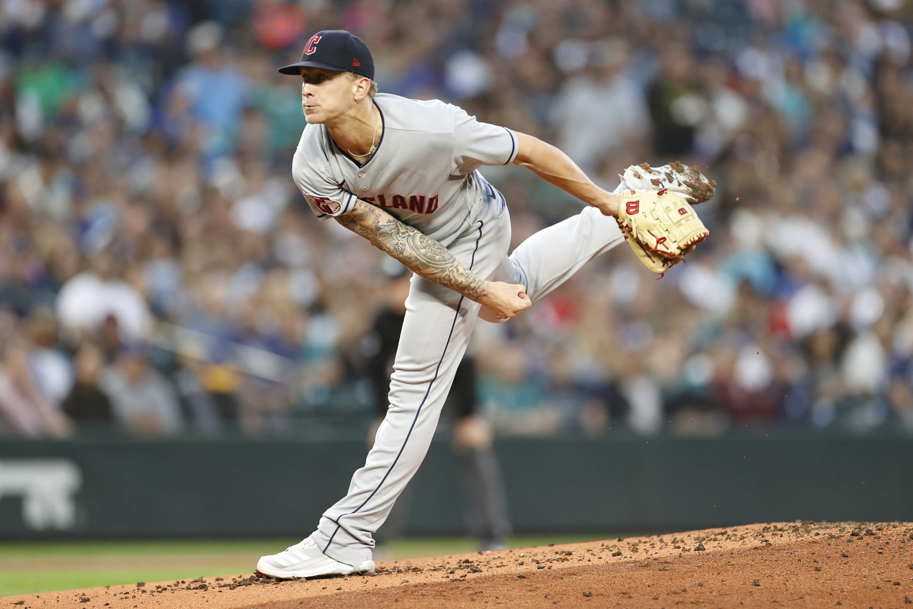 SEATTLE, WASHINGTON - AUGUST 27: Zach Plesac #34 of the Cleveland Guardians pitches during the first inning against the Seattle Mariners at T-Mobile Park on August 27, 2022 in Seattle, Washington. (Photo by Steph Chambers/Getty Images)