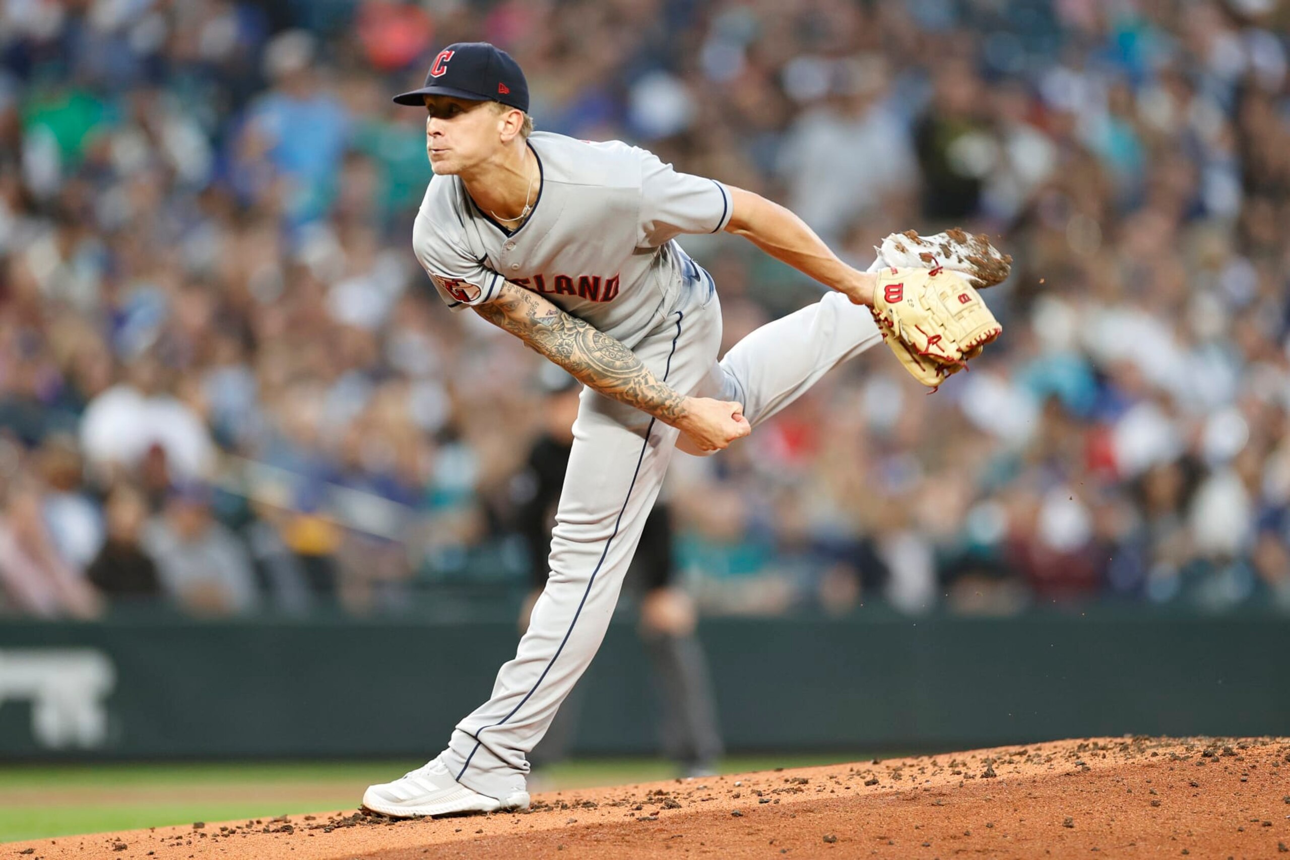 SEATTLE, WASHINGTON - AUGUST 27: Zach Plesac #34 of the Cleveland Guardians pitches during the first inning against the Seattle Mariners at T-Mobile Park on August 27, 2022 in Seattle, Washington. (Photo by Steph Chambers/Getty Images)