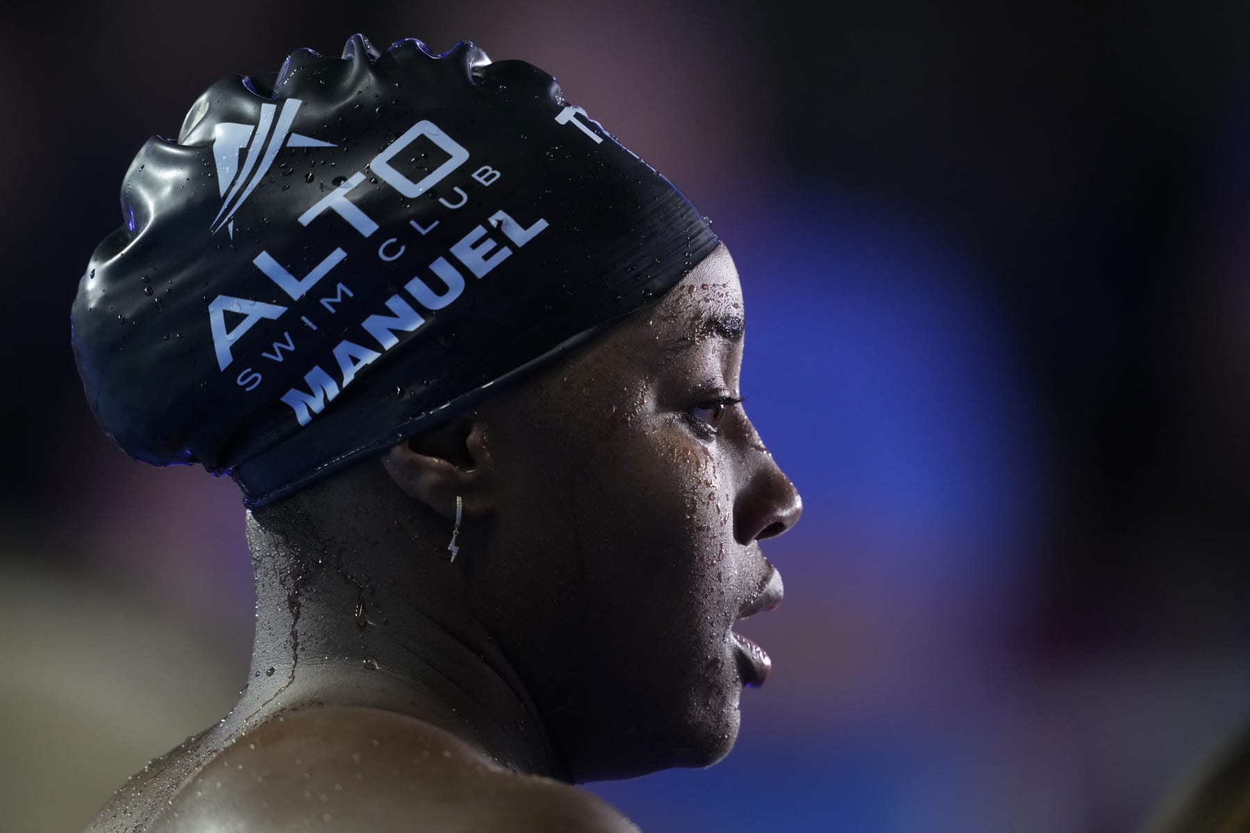 Simone Manuel is interviewed after winning the women's 50-meter freestyle final during wave 2 of the U.S. Olympic Swim Trials on Sunday, June 20, 2021, in Omaha, Neb. (AP Photo/Charlie Neibergall)