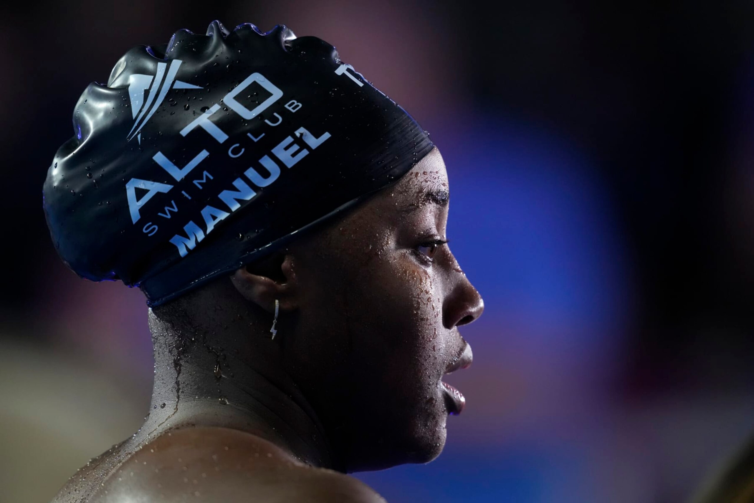 Simone Manuel is interviewed after winning the women's 50-meter freestyle final during wave 2 of the U.S. Olympic Swim Trials on Sunday, June 20, 2021, in Omaha, Neb. (AP Photo/Charlie Neibergall)