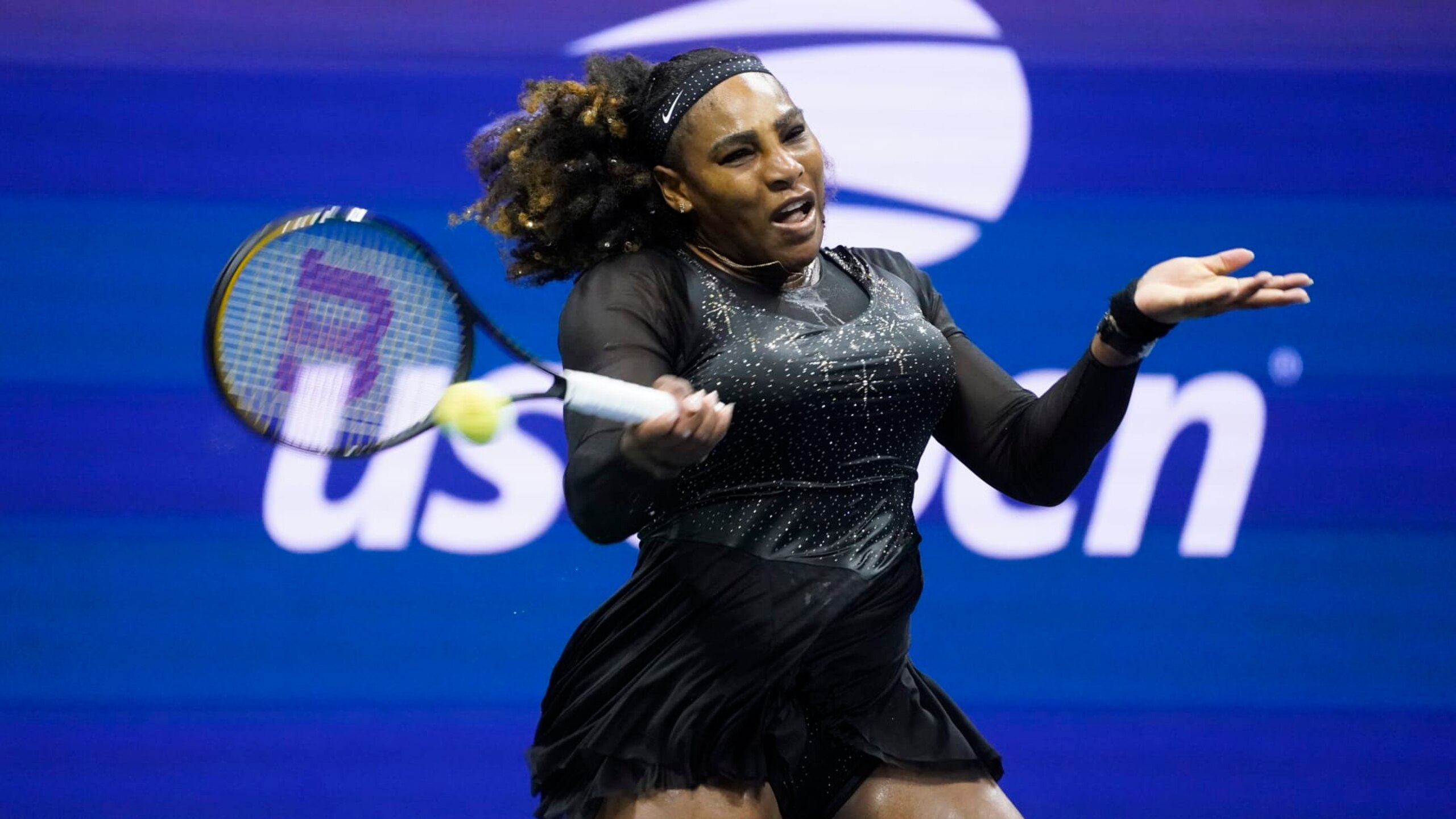 Serena Williams, of the United States, scores the winning point in a tiebreak with Ajla Tomljanovic, of Australia, during the third round of the U.S. Open tennis championships, Friday, Sept. 2, 2022, in New York. (AP Photo/John Minchillo)