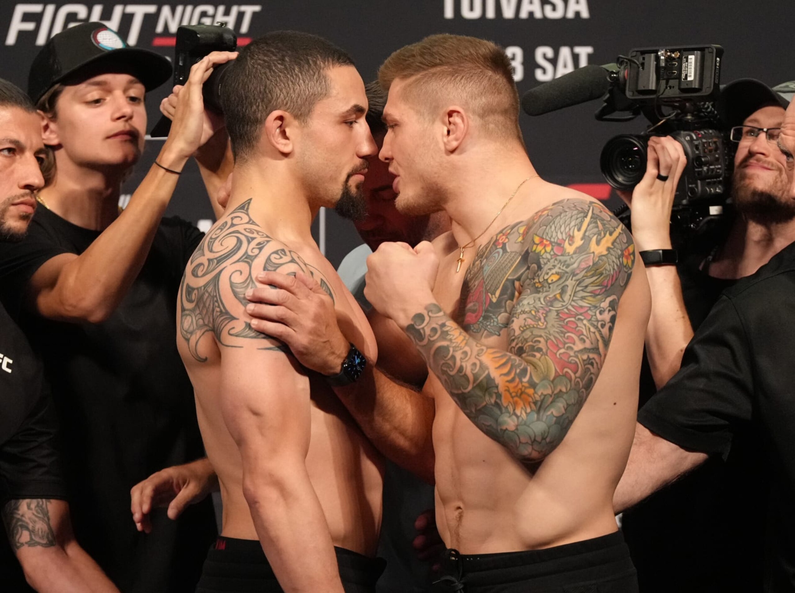 PARIS, FRANCE - SEPTEMBER 02: (L-R) Opponents Robert Whittaker of New Zealand and Marvin Vettori of Italy face off during the UFC Fight Night ceremonial weigh-in at The Accor Arena on September 02, 2022 in Paris, France. (Photo by Jeff Bottari/Zuffa LLC) PARIS, FRANCE - SEPTEMBER 02: (L-R) Opponents Robert Whittaker of New Zealand and Marvin Vettori of Italy face off during the UFC Fight Night ceremonial weigh-in at The Accor Arena on September 02, 2022 in Paris, France. (Photo by Jeff Bottari/Zuffa LLC)