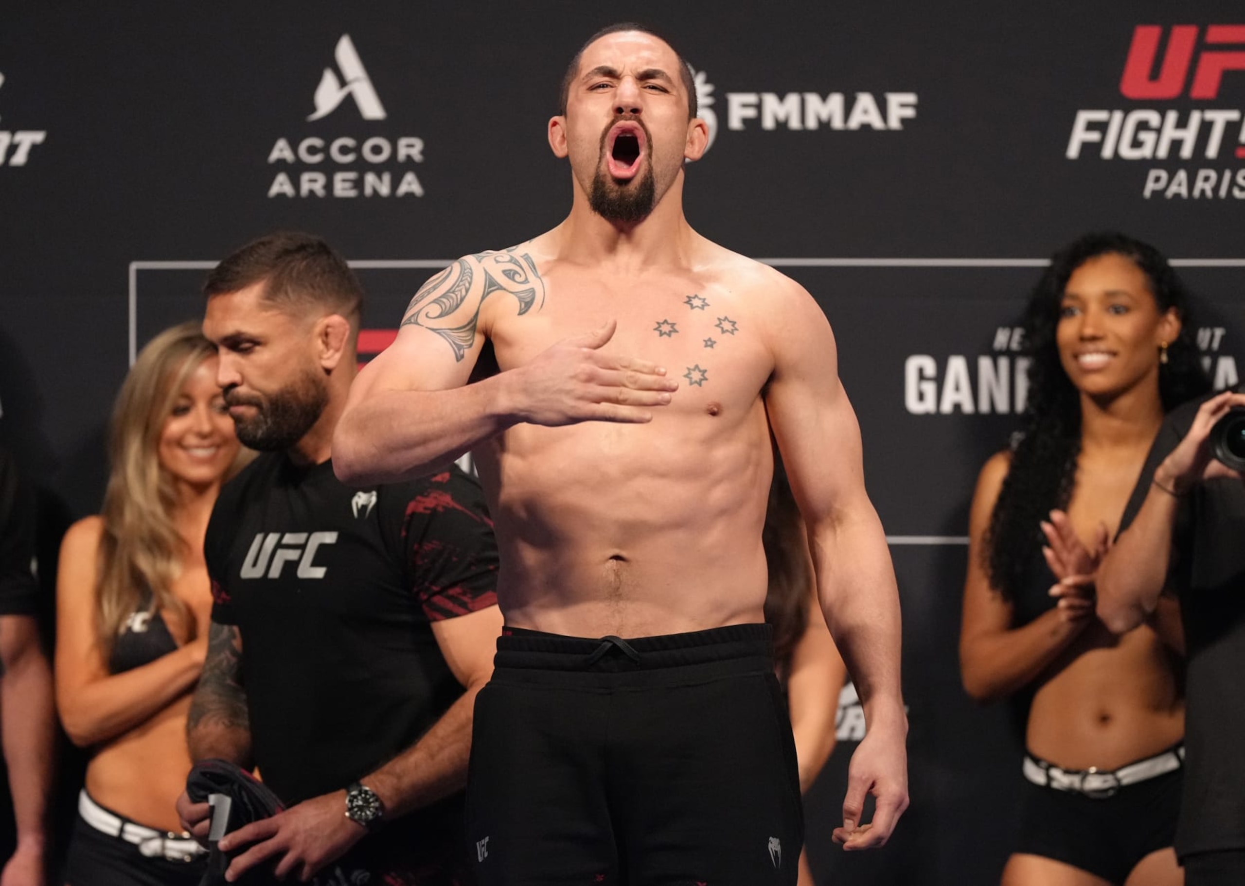 PARIS, FRANCE - SEPTEMBER 02: Robert Whittaker of New Zealand poses on the scale during the UFC Fight Night ceremonial weigh-in at The Accor Arena on September 02, 2022 in Paris, France. (Photo by Jeff Bottari/Zuffa LLC) PARIS, FRANCE - SEPTEMBER 02: Robert Whittaker of New Zealand poses on the scale during the UFC Fight Night ceremonial weigh-in at The Accor Arena on September 02, 2022 in Paris, France. (Photo by Jeff Bottari/Zuffa LLC)