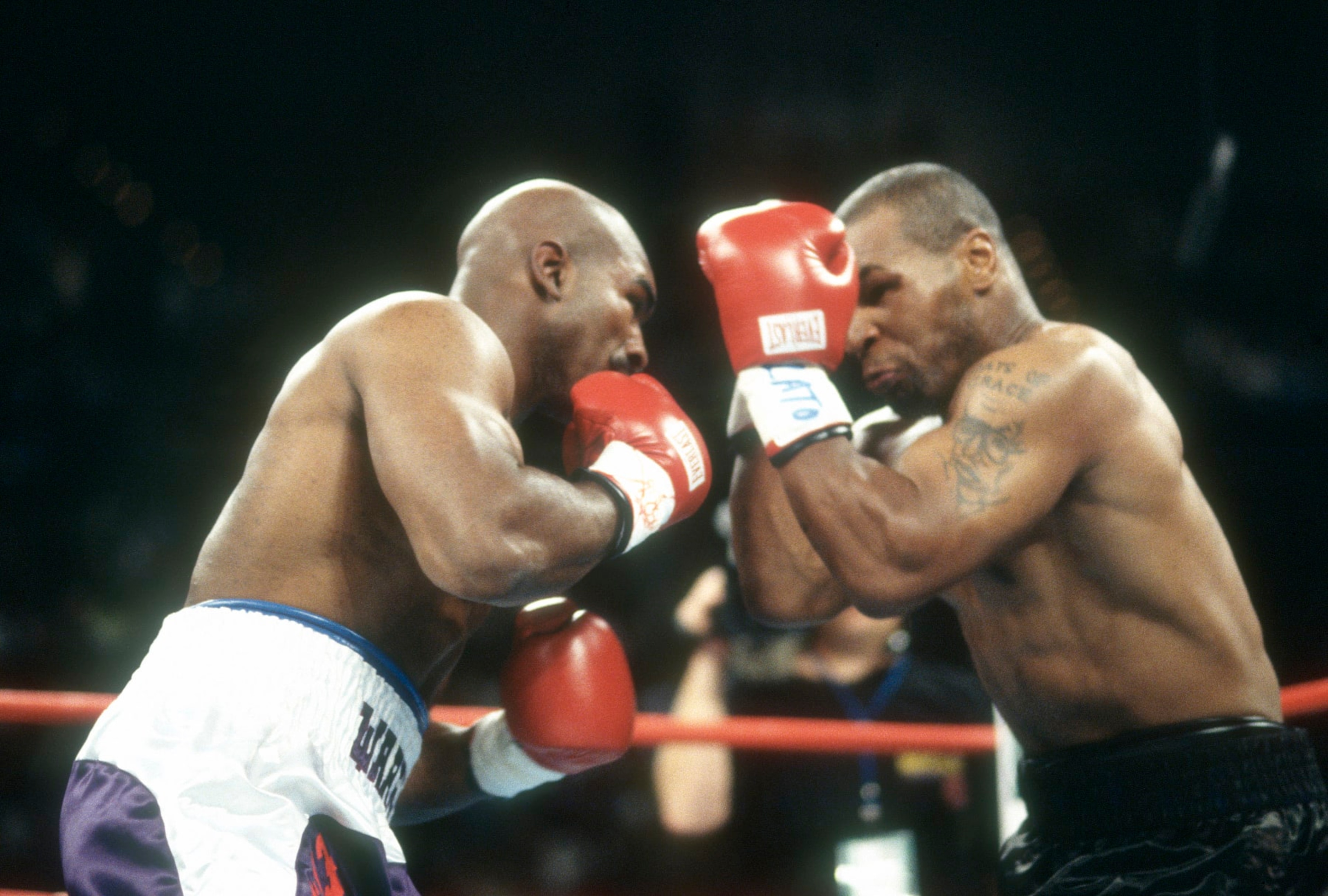 LAS VEGAS, NV - JUNE 28: Evander Holyfield and Mike Tyson fight for WBA World Heavyweight Title on June 28,1997 at the MGM Grand Garden in Las Vegas, Nevada. The Fight was stop in the third round and Tyson was disqualified for biting Holyfield on both ears. (Photo by Focus on Sport/Getty Images)