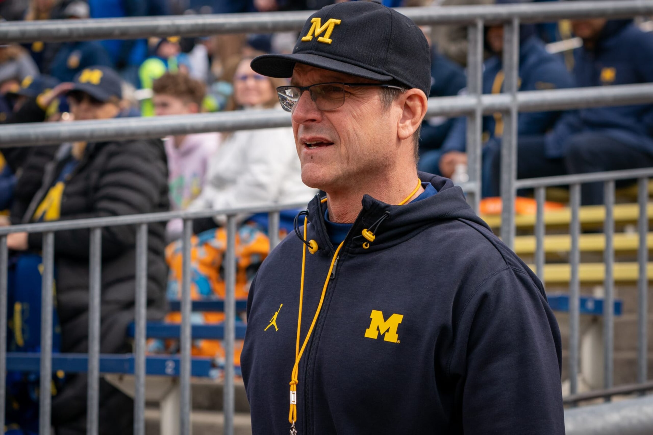 ANN ARBOR, MI - APRIL 02: Michigan Football Head Coach, Jim Harbaugh, walks out of the tunnel prior to the spring football game at Michigan Stadium on April 2, 2022 in Ann Arbor, Michigan. (Photo by Jaime Crawford/Getty Images)