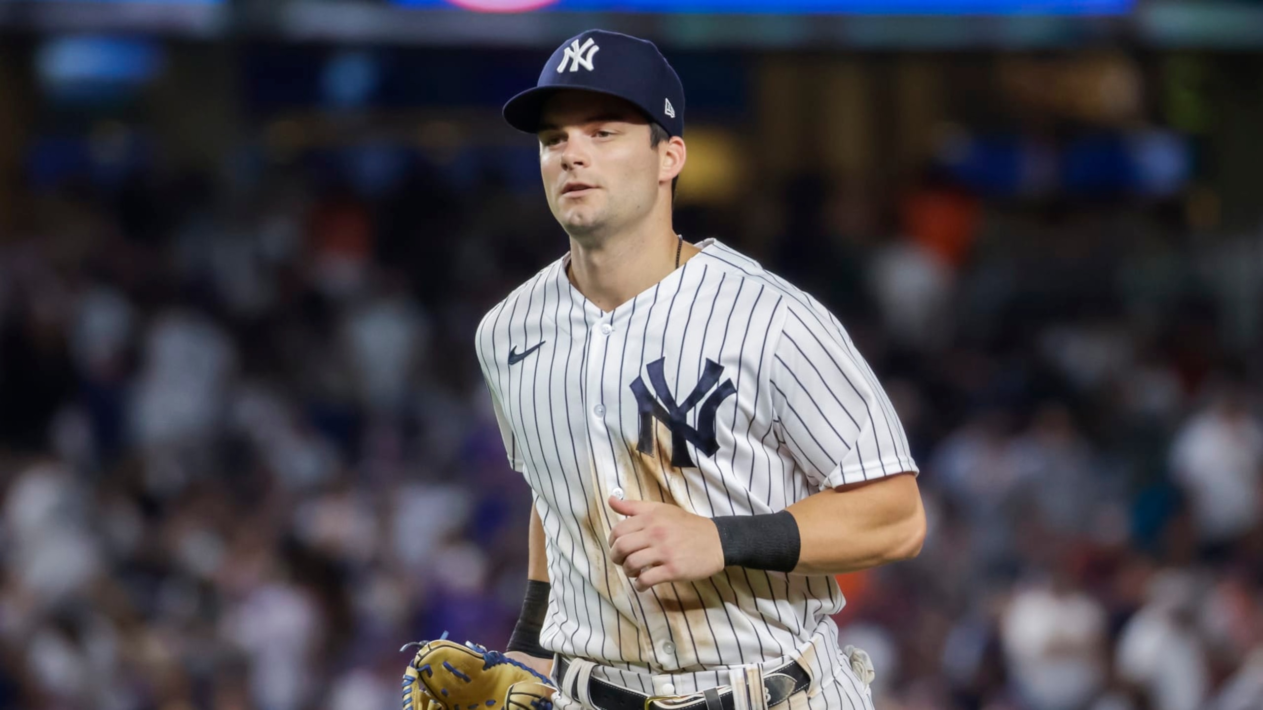 New York Yankees' Andrew Benintendi runs toward the dugout in the seventh inning of a baseball game against the New York Mets, Monday, Aug. 22, 2022, in New York. (AP Photo/Corey Sipkin)