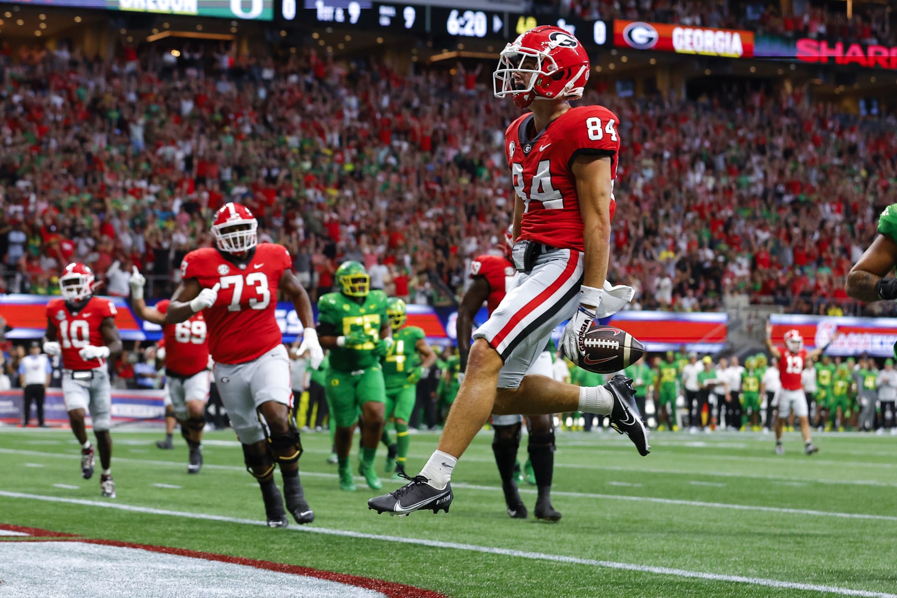 ATLANTA, GA - SEPTEMBER 03: Ladd McConkey #84 of the Georgia Bulldogs scores a touchdown during the first half against the Oregon Ducks at Mercedes-Benz Stadium on September 3, 2022 in Atlanta, Georgia. (Photo by Todd Kirkland/Getty Images)