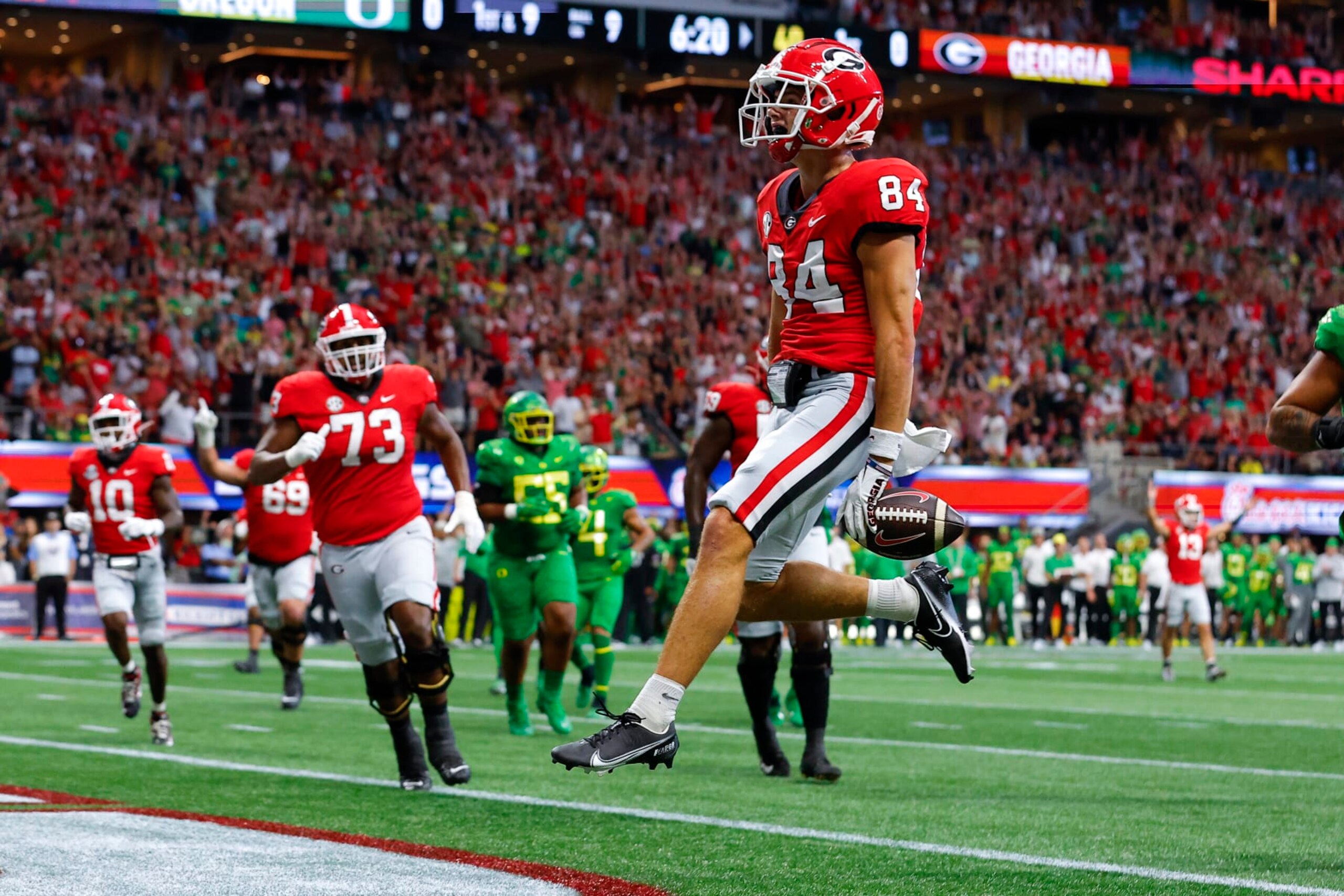 ATLANTA, GA - SEPTEMBER 03: Ladd McConkey #84 of the Georgia Bulldogs scores a touchdown during the first half against the Oregon Ducks at Mercedes-Benz Stadium on September 3, 2022 in Atlanta, Georgia. (Photo by Todd Kirkland/Getty Images) ATLANTA, GA - SEPTEMBER 03: Ladd McConkey #84 of the Georgia Bulldogs scores a touchdown during the first half against the Oregon Ducks at Mercedes-Benz Stadium on September 3, 2022 in Atlanta, Georgia. (Photo by Todd Kirkland/Getty Images)