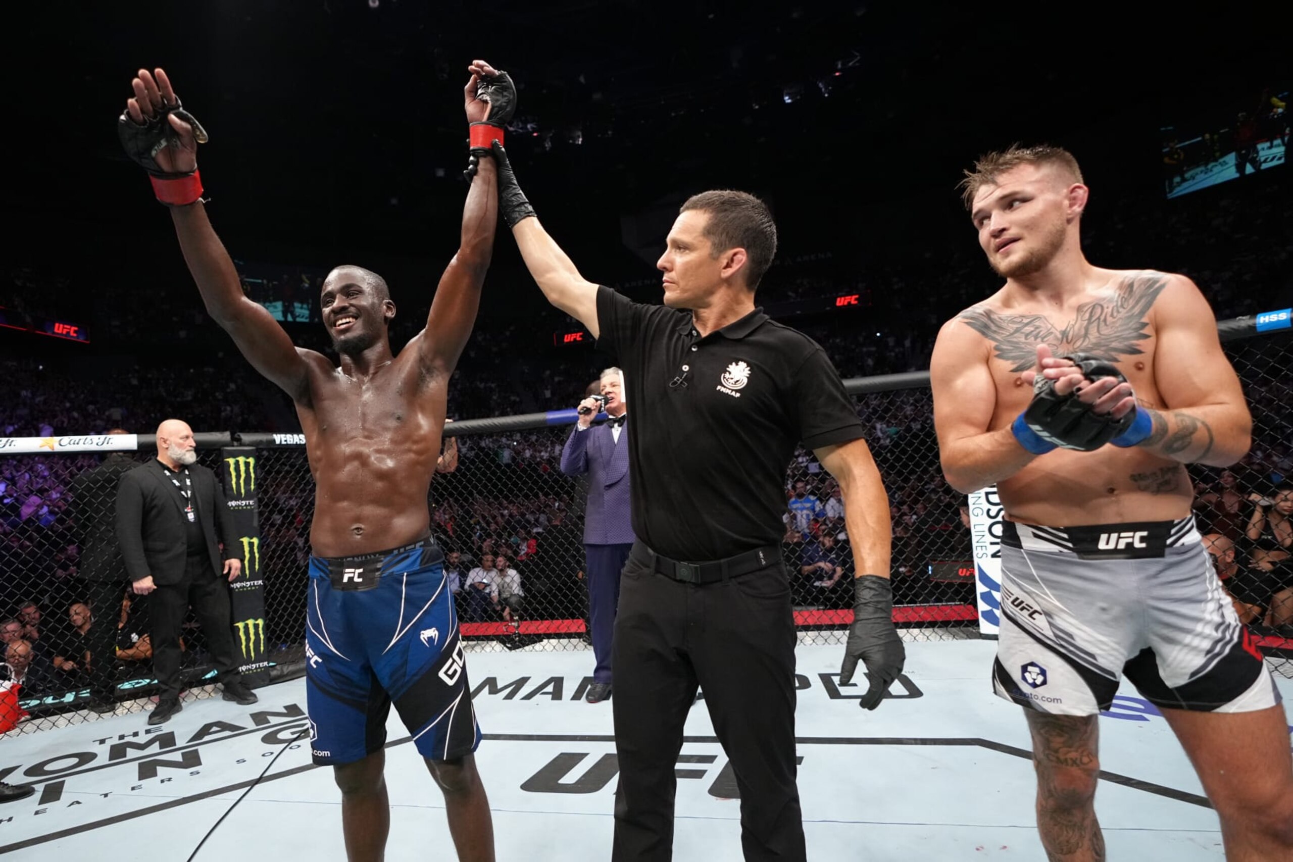 PARIS, FRANCE - SEPTEMBER 03:  (L-R) William Gomis of France celebrates his victory over Jarno Errens of Netherlands in a featherweight fight during the UFC Fight Night event at The Accor Arena on September 03, 2022 in Paris, France. (Photo by Jeff Bottari/Zuffa LLC)