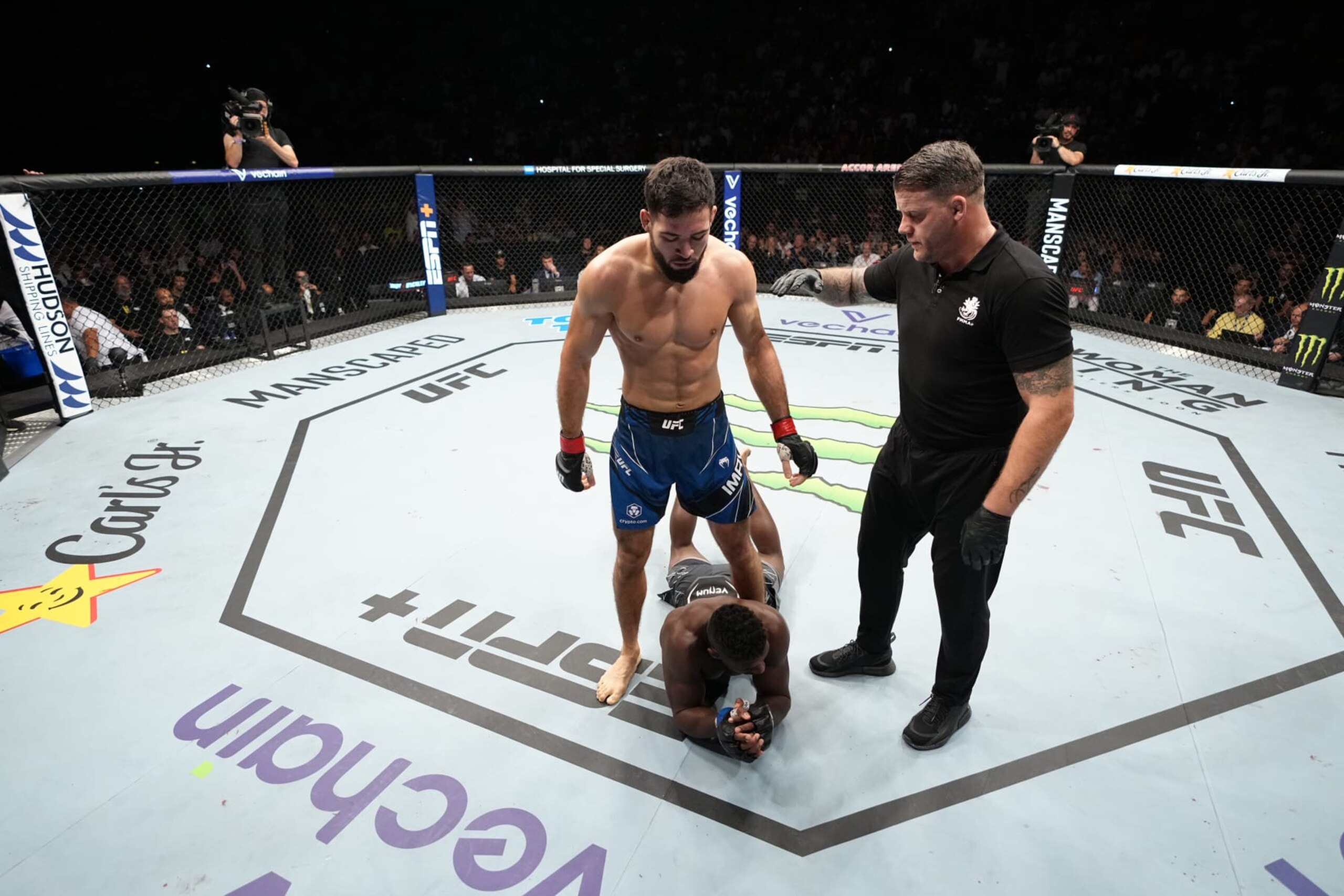PARIS, FRANCE - SEPTEMBER 03: Nassourdine Imavov of Russia stands over Joaquin Buckley after the first round of their middleweight fight during the UFC Fight Night event at The Accor Arena on September 03, 2022 in Paris, France. (Photo by Jeff Bottari/Zuffa LLC)