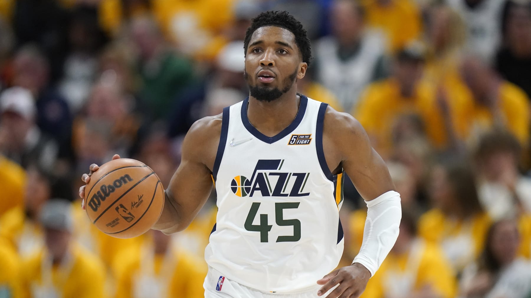 Utah Jazz guard Donovan Mitchell (45) brings the ball upcourt in the second half of Game 4 of an NBA basketball first-round playoff series against the Dallas Mavericks, Saturday, April 23, 2022, in Salt Lake City. (AP Photo/Rick Bowmer)