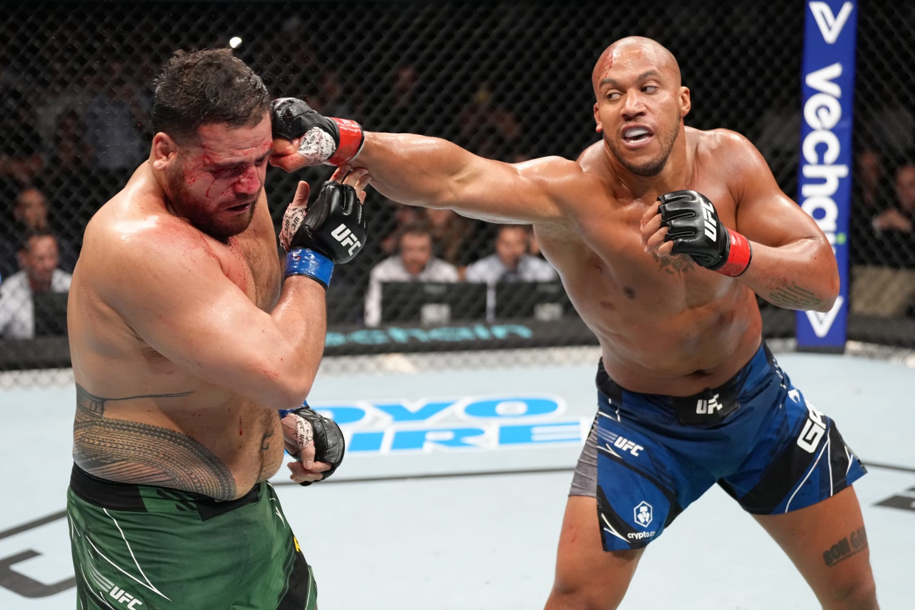 PARIS, FRANCE - SEPTEMBER 03: (R-L) Ciryl Gane of France punches Tai Tuivasa of Australia in a heavyweight fight during the UFC Fight Night event at The Accor Arena on September 03, 2022 in Paris, France. (Photo by Jeff Bottari/Zuffa LLC)