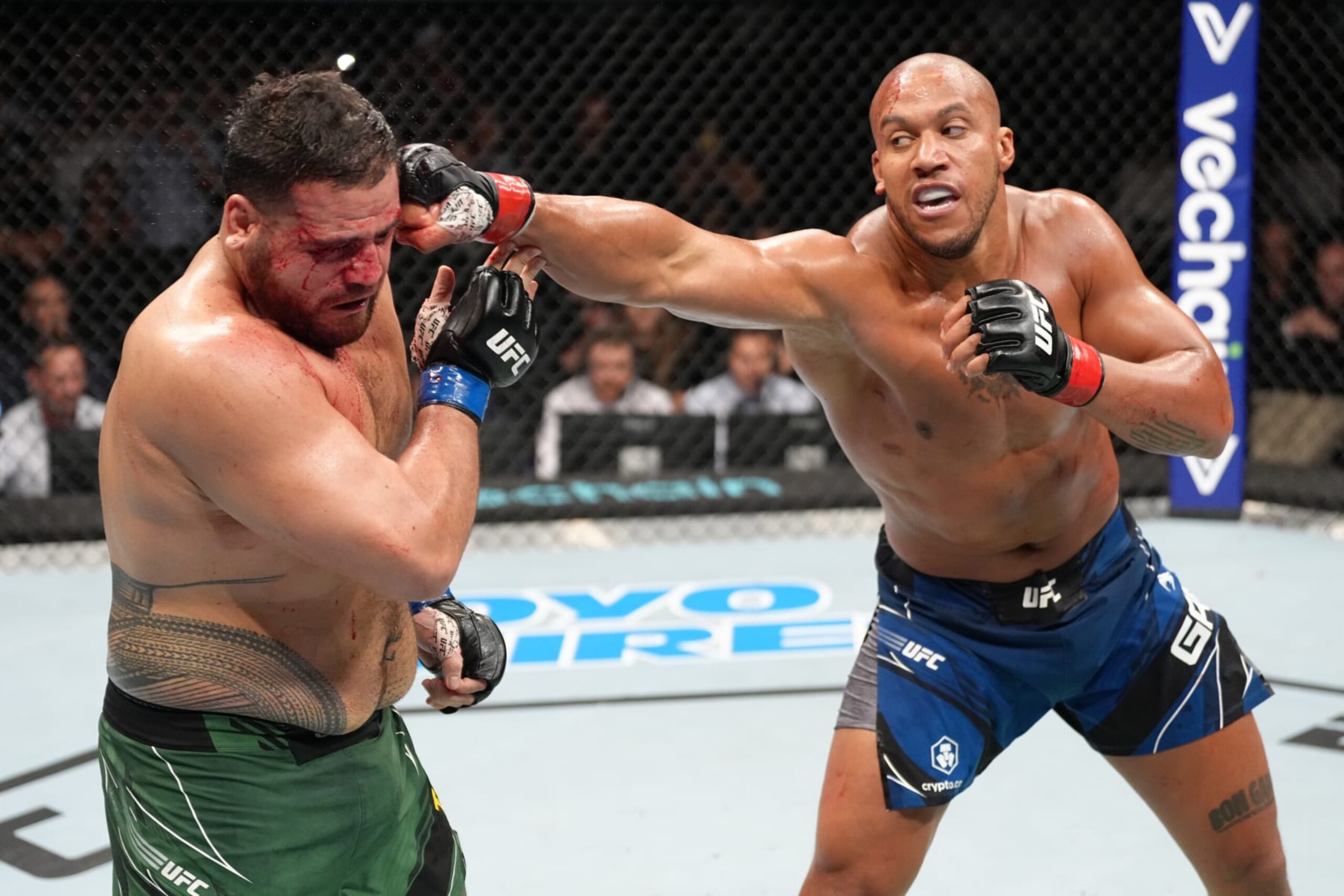 PARIS, FRANCE - SEPTEMBER 03: (R-L) Ciryl Gane of France punches Tai Tuivasa of Australia in a heavyweight fight during the UFC Fight Night event at The Accor Arena on September 03, 2022 in Paris, France. (Photo by Jeff Bottari/Zuffa LLC)