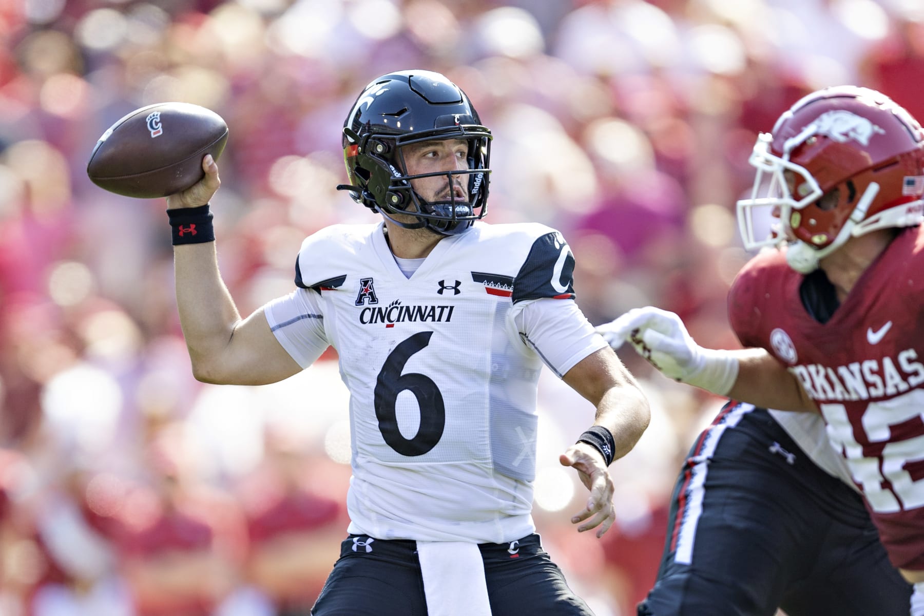 FAYETTEVILLE, ARKANSAS - SEPTEMBER 03: Ben Bryant #6 of the Cincinnati Bearcats throws a pass in the third quarter of a game against the Arkansas Razorbacks at Donald W. Reynolds Razorback Stadium on September 03, 2022 in Fayetteville, Arkansas. The Razorbacks defeated the Bearcats 31-24. (Photo by Wesley Hitt/Getty Images)