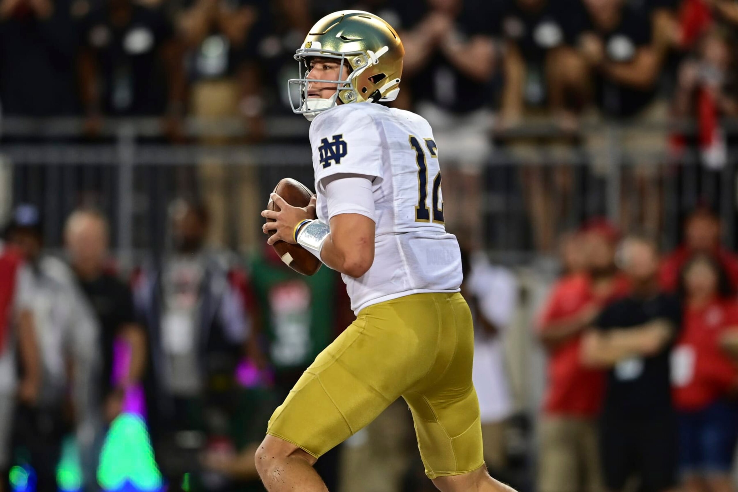 Notre Dame quarterback Tyler Buchner looks to throw during the first quarter of an NCAA college football game against Ohio State, Saturday, Sept. 3, 2022, in Columbus, Ohio. (AP Photo/David Dermer)