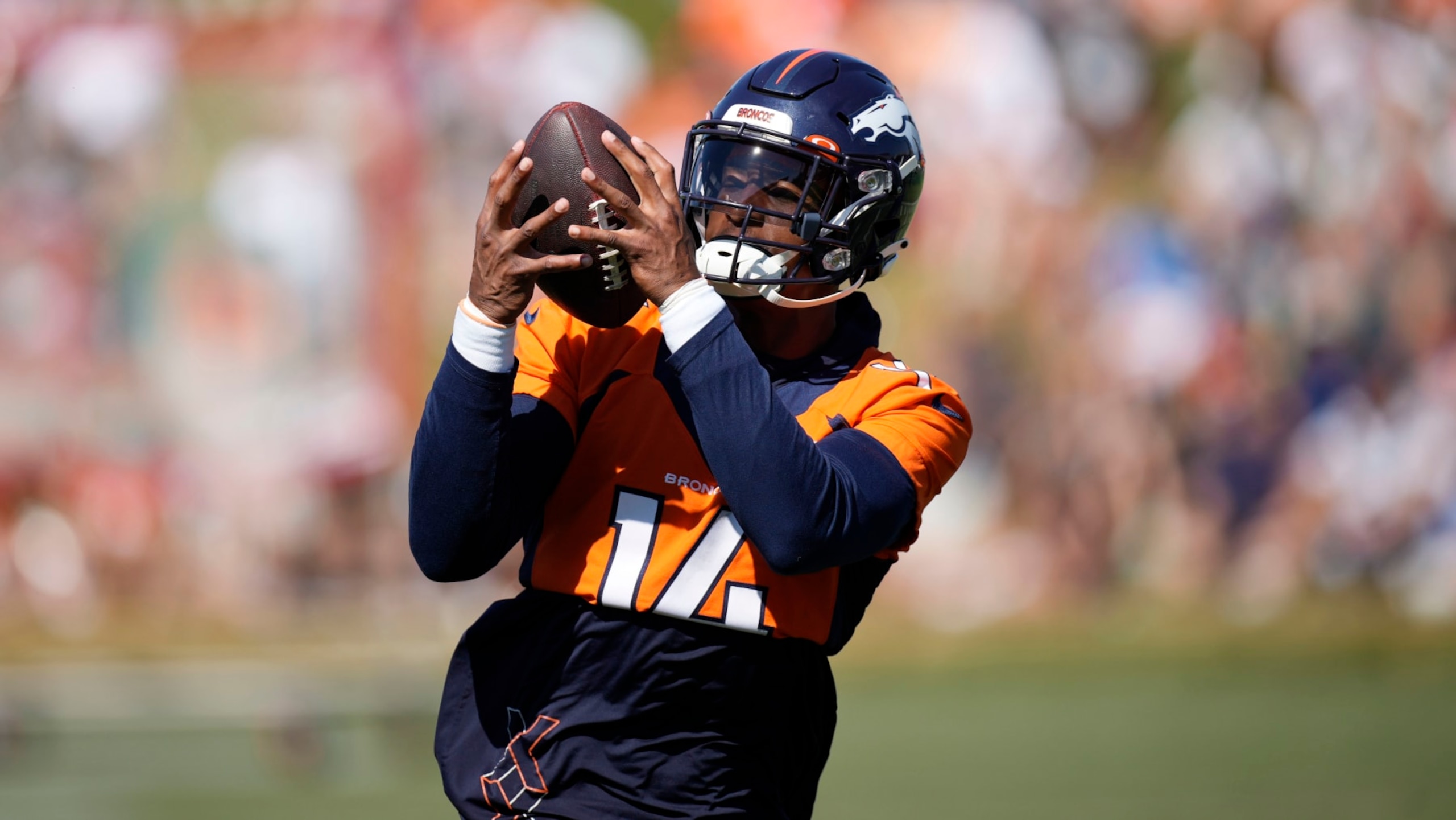 Denver Broncos wide receiver Courtland Sutton (14) takes part in drills during the NFL football team's training camp Friday, Aug. 5, 2022, at the Broncos' headquarters in Centennial, Colo. (AP Photo/David Zalubowski) Denver Broncos wide receiver Courtland Sutton (14) takes part in drills during the NFL football team's training camp Friday, Aug. 5, 2022, at the Broncos' headquarters in Centennial, Colo. (AP Photo/David Zalubowski)