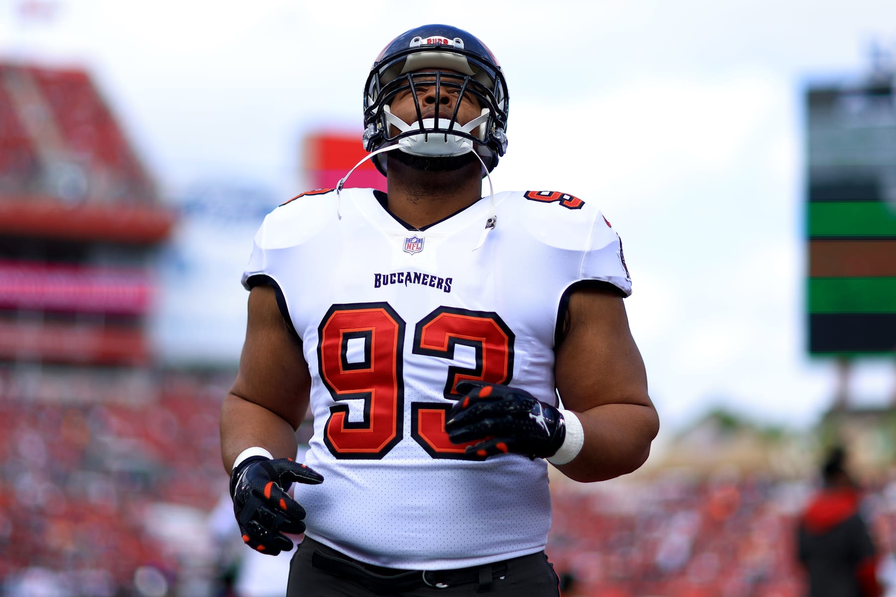 TAMPA, FLORIDA - JANUARY 16: Ndamukong Suh #93 of the Tampa Bay Buccaneers warms up prior to the NFC Wild Card Playoff game against the Philadelphia Eagles at Raymond James Stadium on January 16, 2022 in Tampa, Florida. (Photo by Mike Ehrmann/Getty Images)